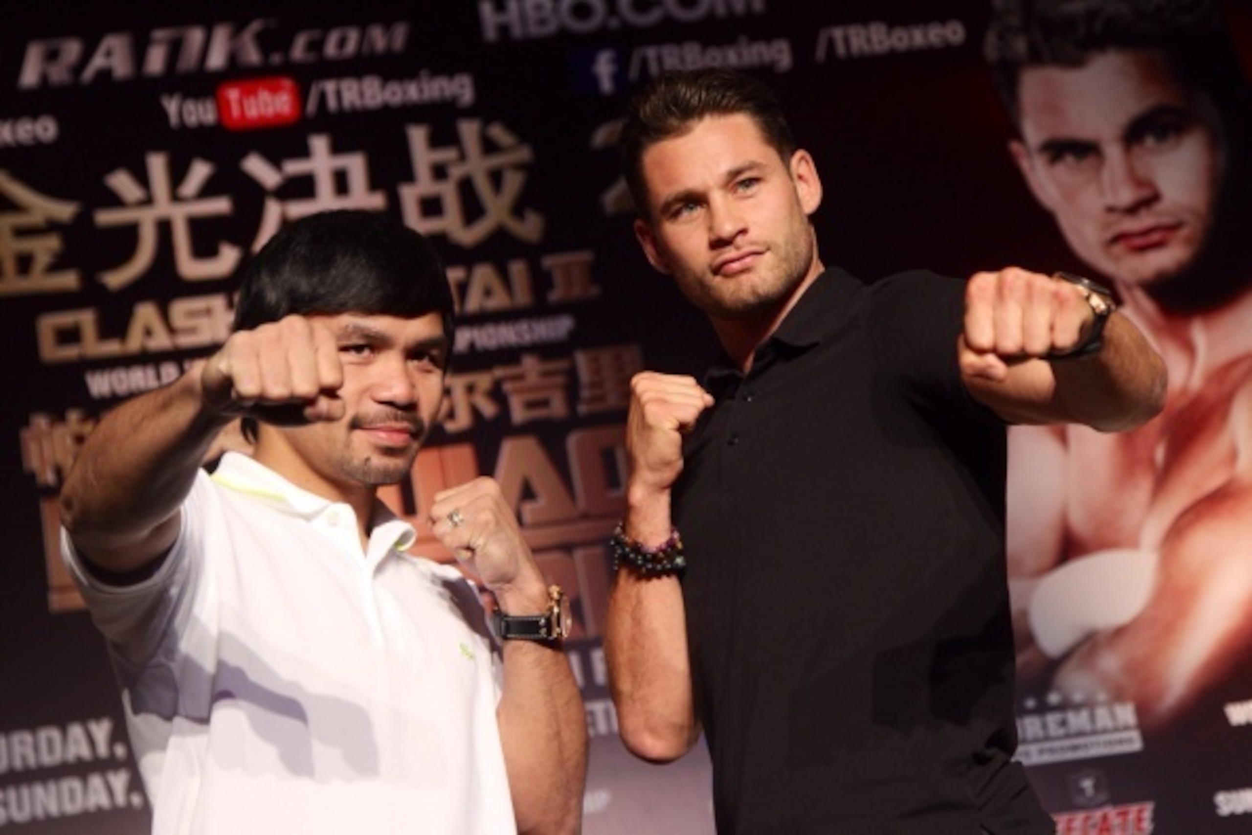 SHANGHAI, CHINA - AUGUST 26:  (CHINA OUT) Manny Pacquiao (L) of the Philippines and Chris Algieri of the U.S. attend a press conference ahead of a World Boxing Organization (WBO) welterweight title fight on August 26, 2014 in Shanghai, China.  (Photo by C