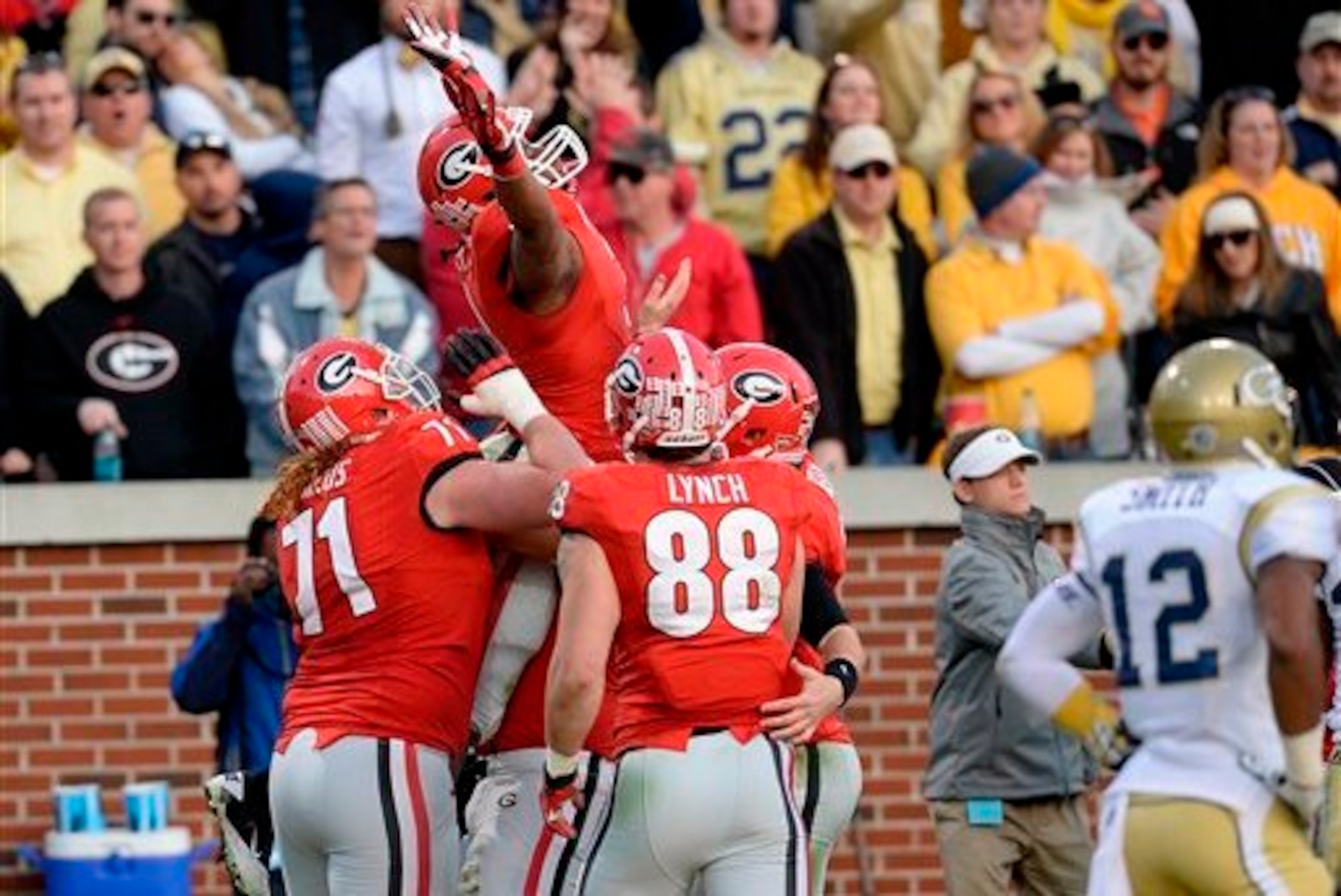Teammates lift Todd Gurley up in 2013. Teammates lift Todd Gurley up in 2013.