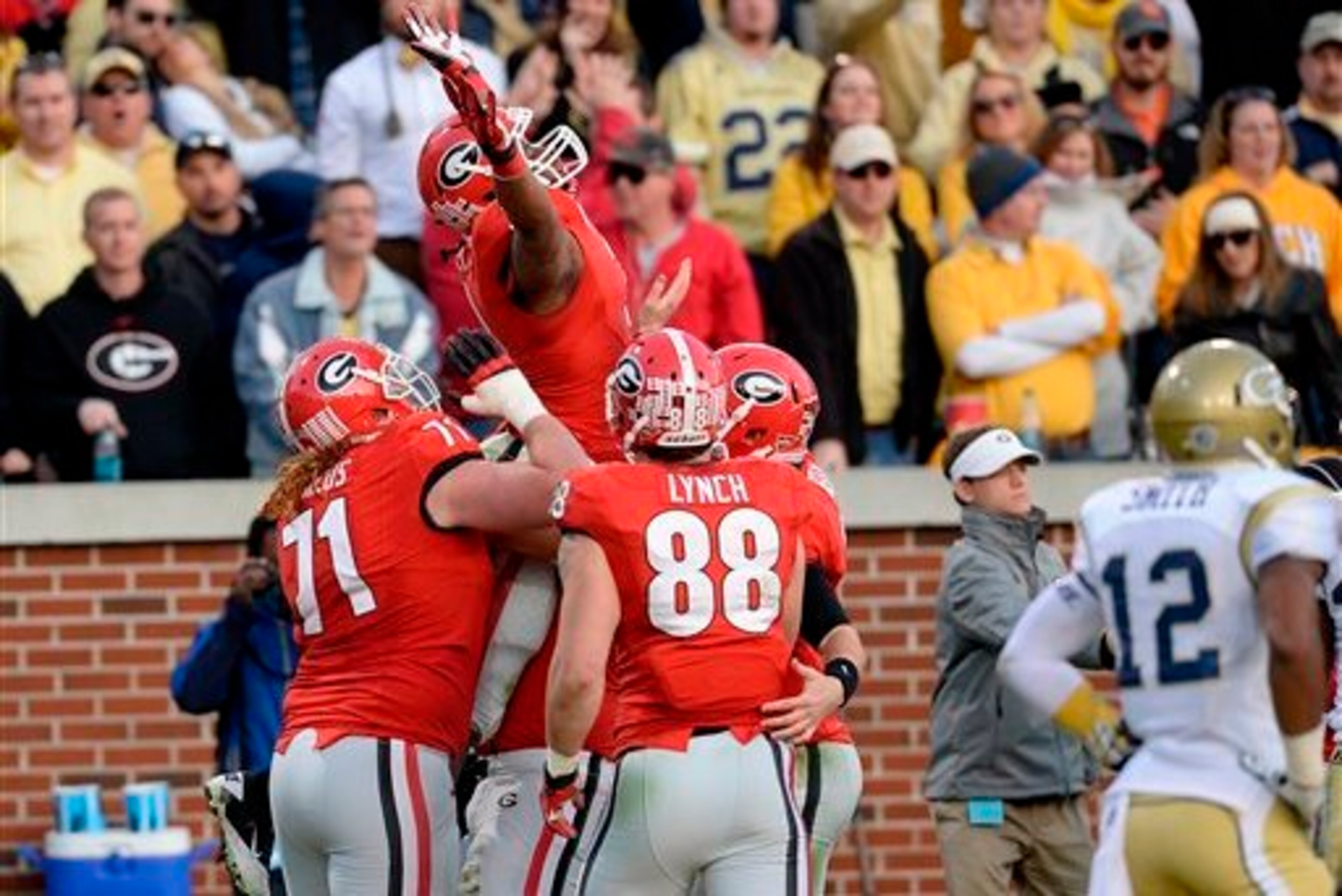 Teammates lift Todd Gurley up in 2013. Teammates lift Todd Gurley up in 2013.