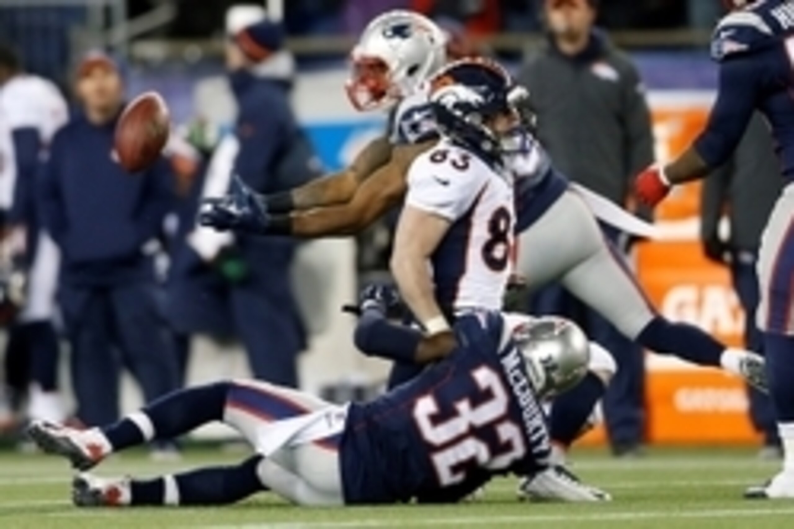 Nov 2, 2014; Foxborough, MA, USA; New England Patriots free safety Devin McCourty (32) breaks up a pass intended for Denver Broncos wide receiver Wes Welker (83) and intercepted by cornerback Brandon Browner (39) during the third quarter at Gillette Stadi