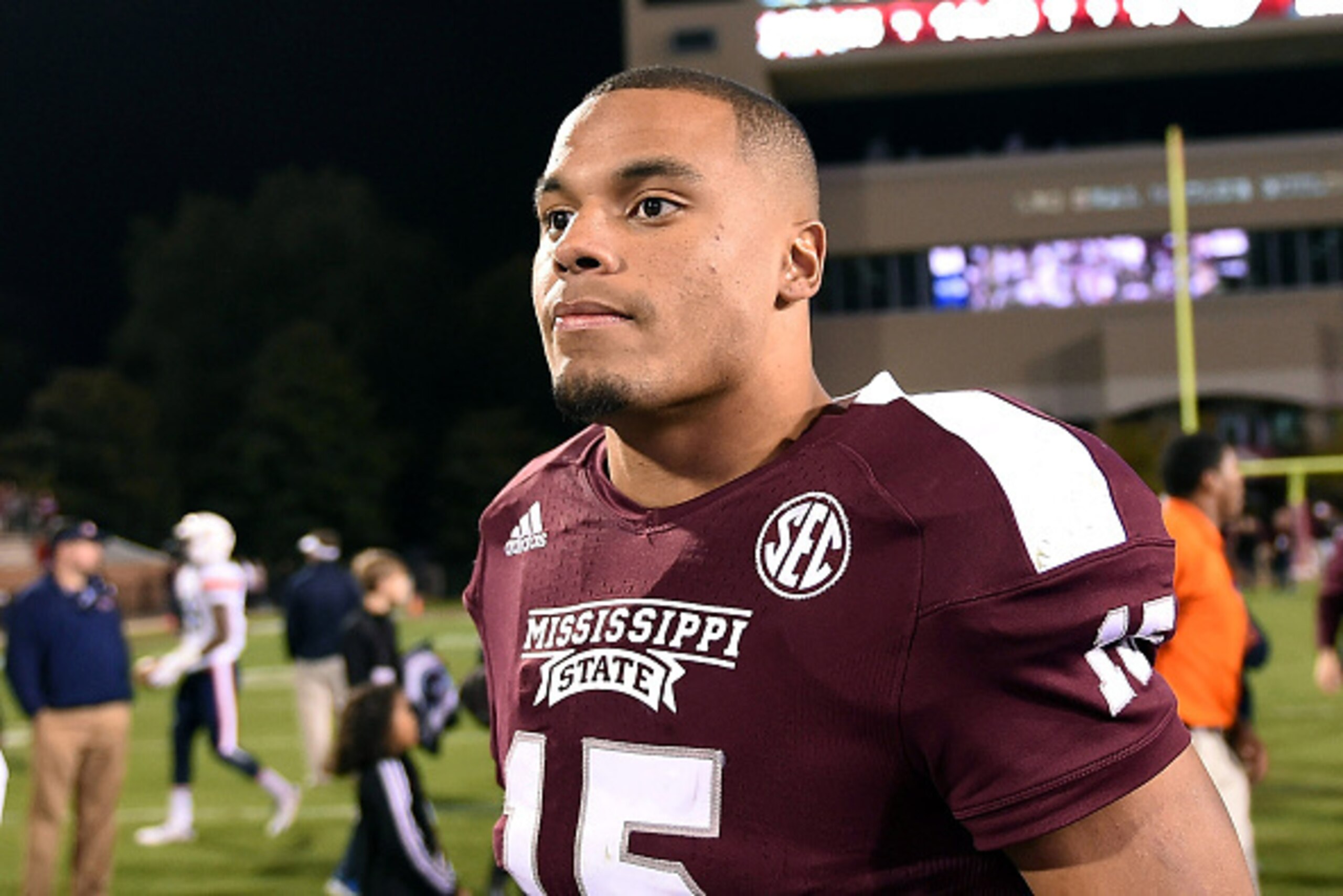 STARKVILLE, MS - NOVEMBER 08:  Dak Prescott #15 of the Mississippi State Bulldogs leaves the field following a game against the Tennessee Martin Skyhawks at Davis Wade Stadium on November 8, 2014 in Starkville, Mississippi.  (Photo by Stacy Revere/Getty I