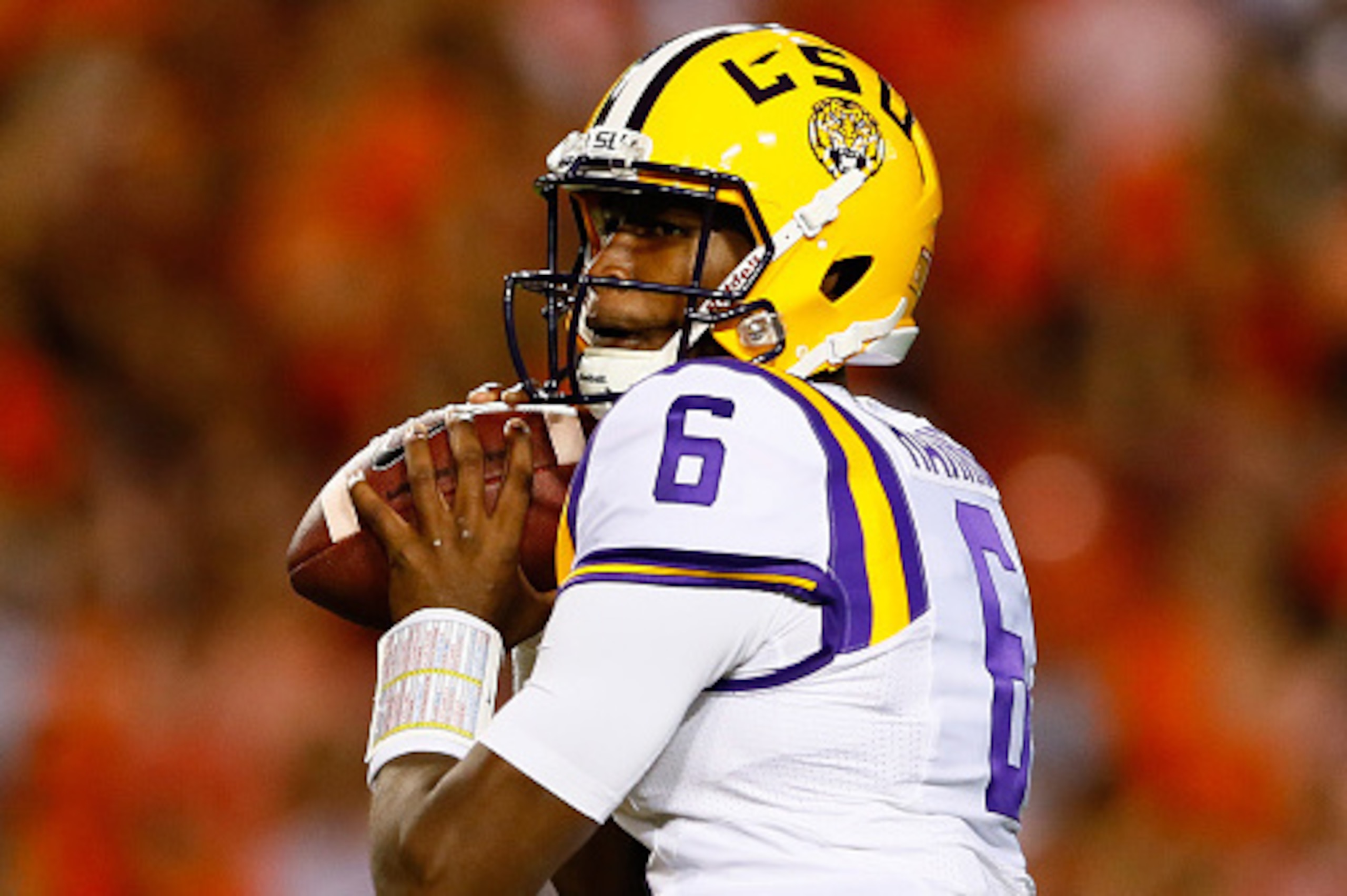 AUBURN, AL - OCTOBER 04:  Brandon Harris #6 of the LSU Tigers looks to pass against the Auburn Tigers at Jordan Hare Stadium on October 4, 2014 in Auburn, Alabama.  (Photo by Kevin C. Cox/Getty Images)