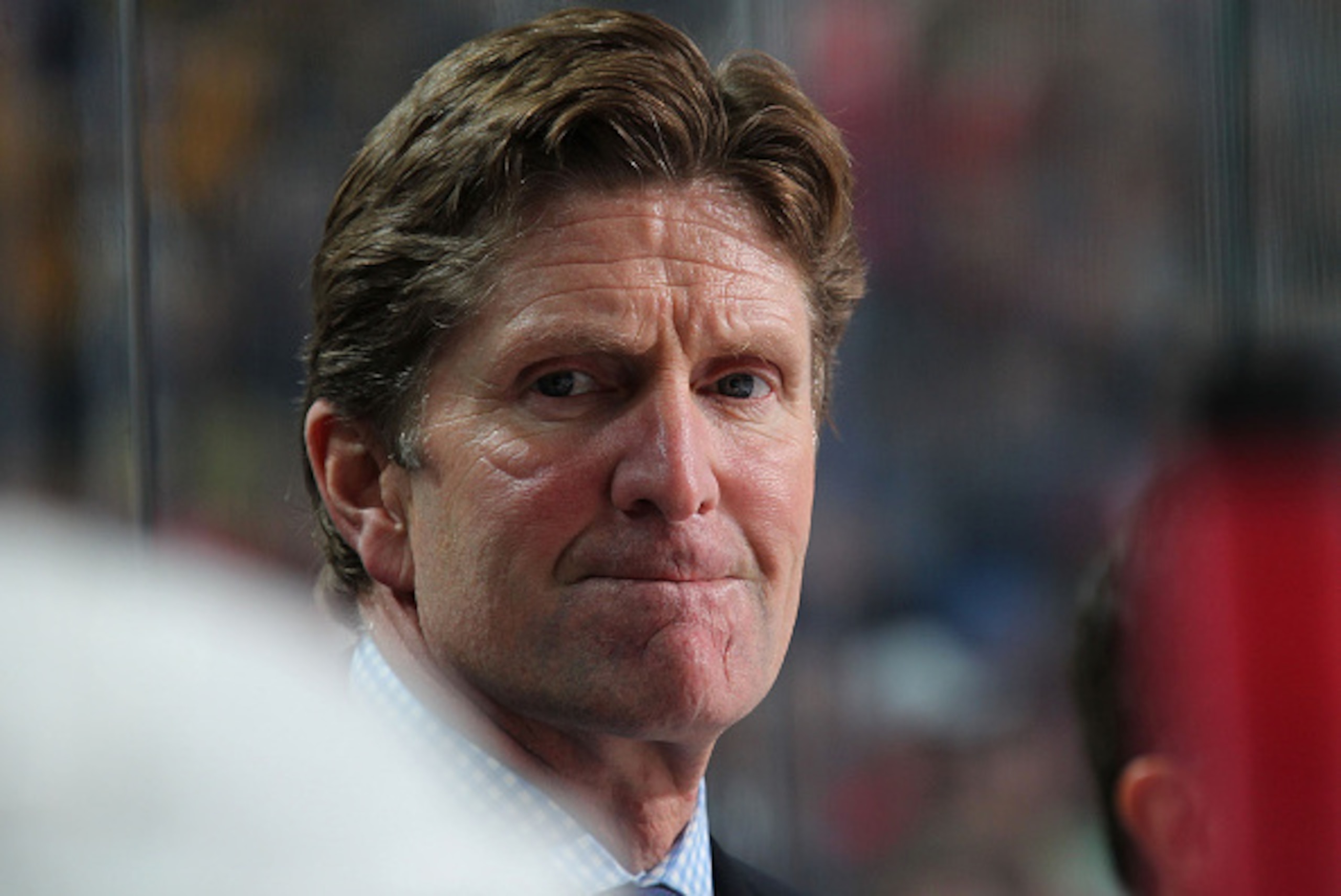 BUFFALO, NY - NOVEMBER 02:  Head coach Mike Babcock of the Detroit Red Wings watches the action against the Buffalo Sabres on November 2, 2014 at the First Niagara Center in Buffalo, New York.  (Photo by Bill Wippert/NHLI via Getty Images)