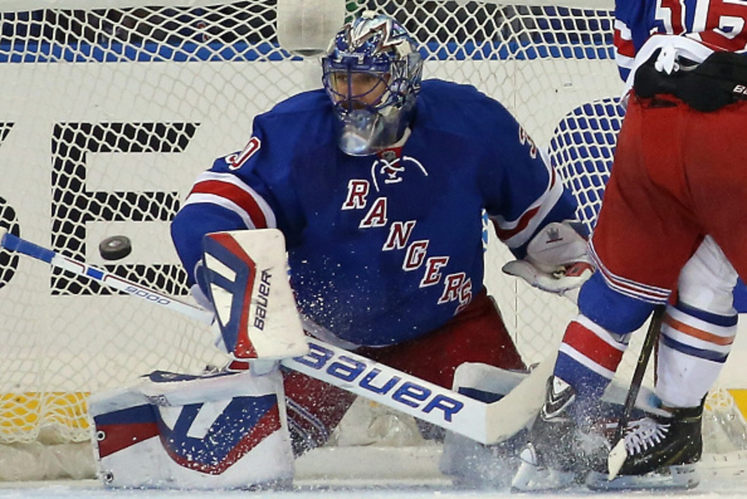 NEW YORK, NY - NOVEMBER 09: Henrik Lundqvist #30 of the New York Rangers makes the second period save against the Edmonton Oilers at Madison Square Garden on November 9, 2014 in New York City.  (Photo by Bruce Bennett/Getty Images)