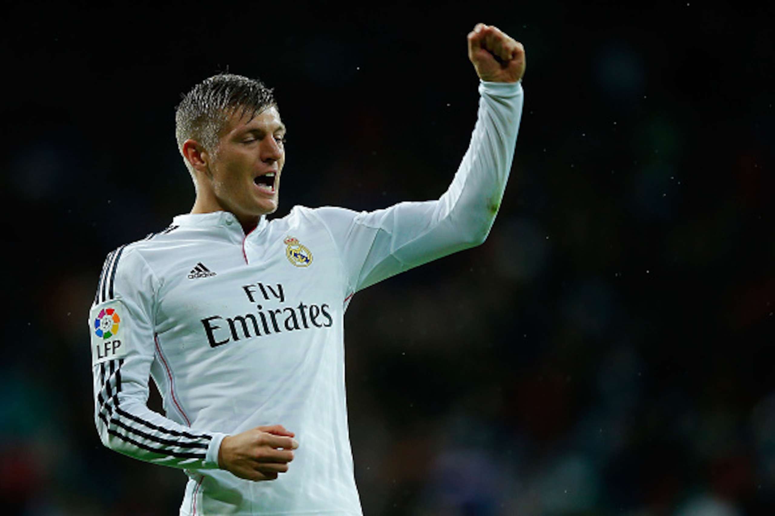 MADRID, SPAIN - NOVEMBER 08:  Toni Kroos of Real Madrid CF celebrates scoring their third goal during the La Liga match between Real Madrid CF and Rayo Vallecano de Madrid at Estadio Santiago Bernabeu on November 8, 2014 in Madrid, Spain.  (Photo by Gonza