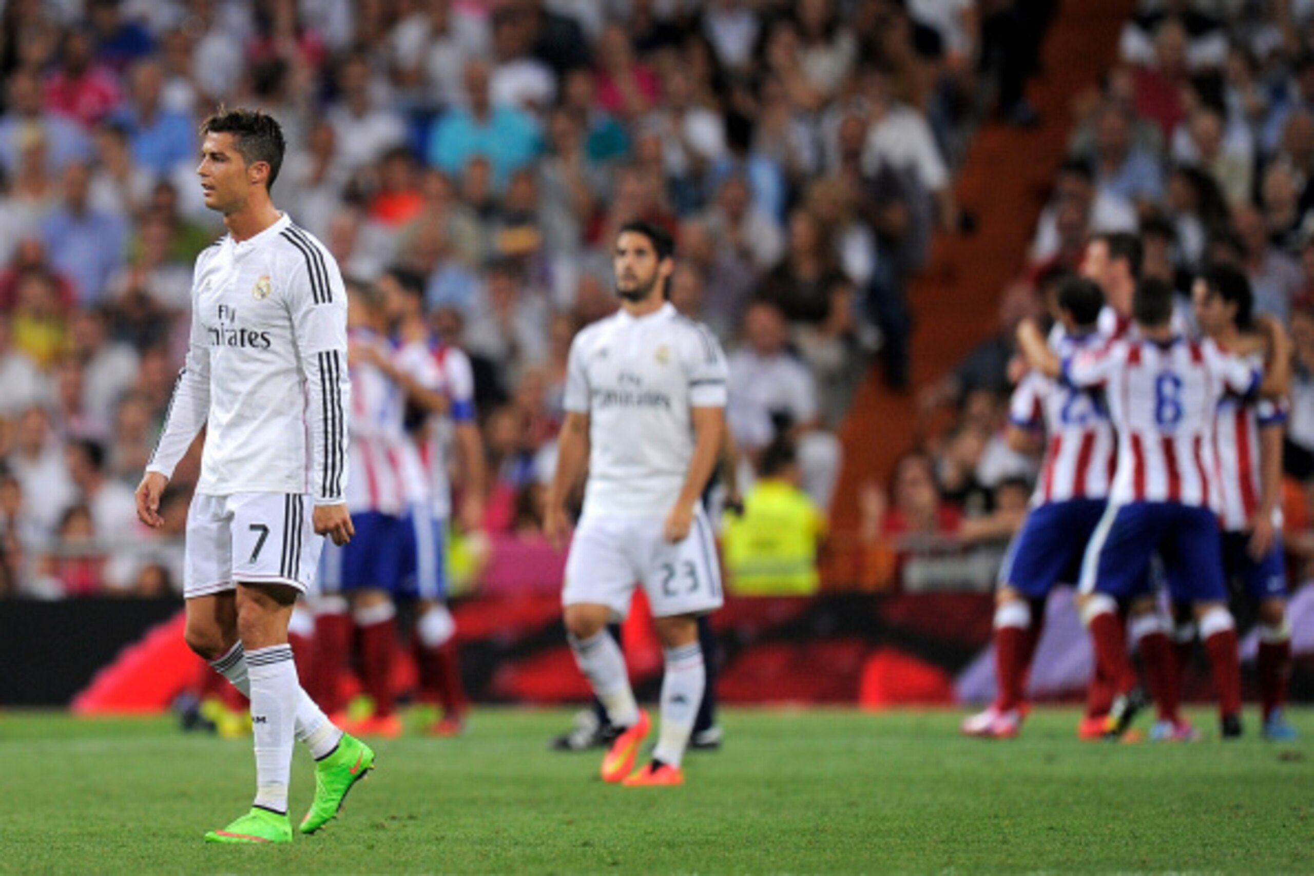 MADRID, SPAIN - SEPTEMBER 13:  Cristiano Ronaldo of Real Madrid reacts after Atletico de Madrid scored their 2nd goal during the La Liga match between Real Madrid and Atletico de Madrid at Estadio Santiago Bernabeu on September 13, 2014 in Madrid, Spain. 