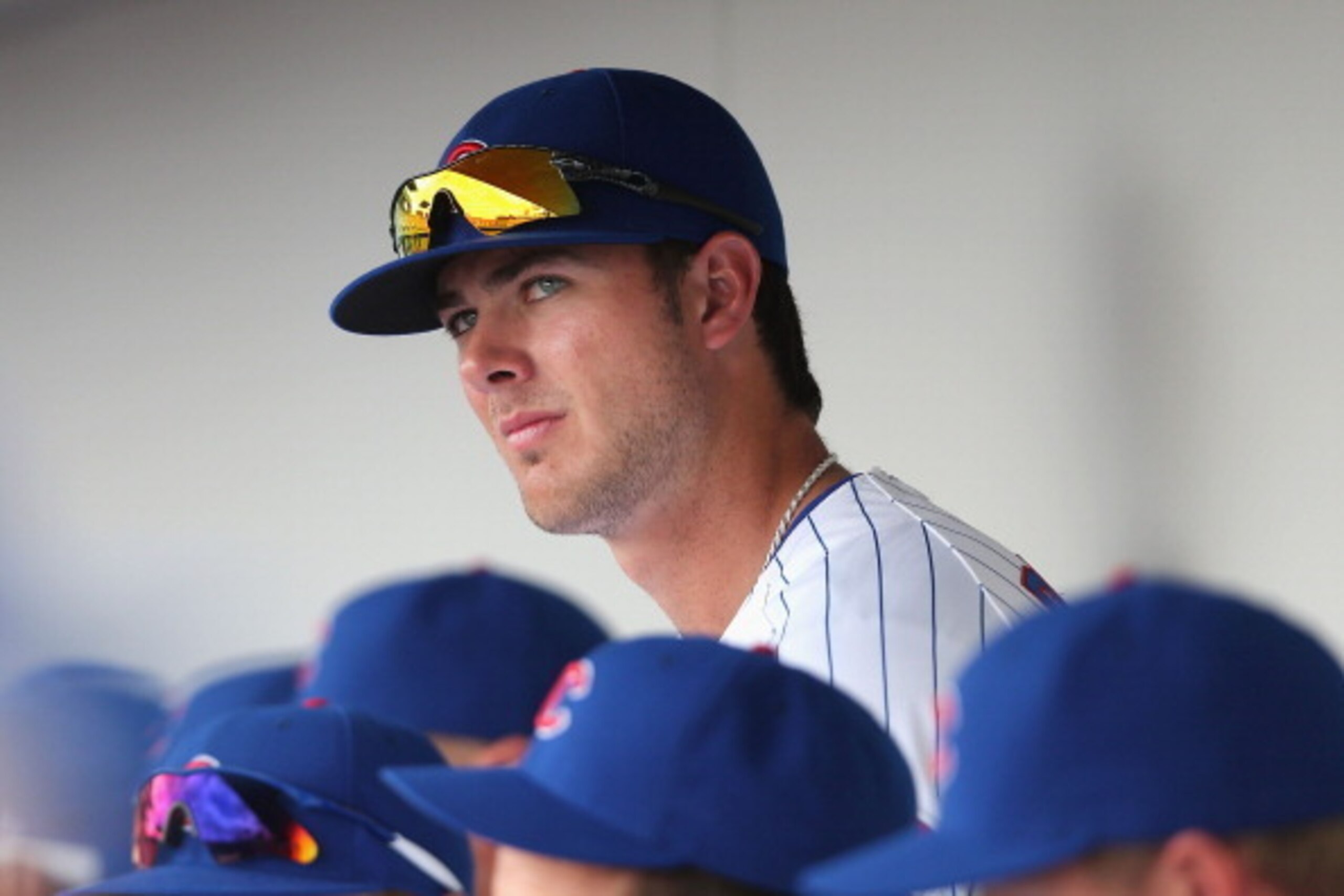 MESA, AZ - FEBRUARY 27:  Kris Bryant #77 of the Chicago Cubs watches from the dugout during the spring training game against the Arizona Diamondbacks at Cubs Park on February 27, 2014 in Mesa, Arizona  (Photo by Christian Petersen/Getty Images)