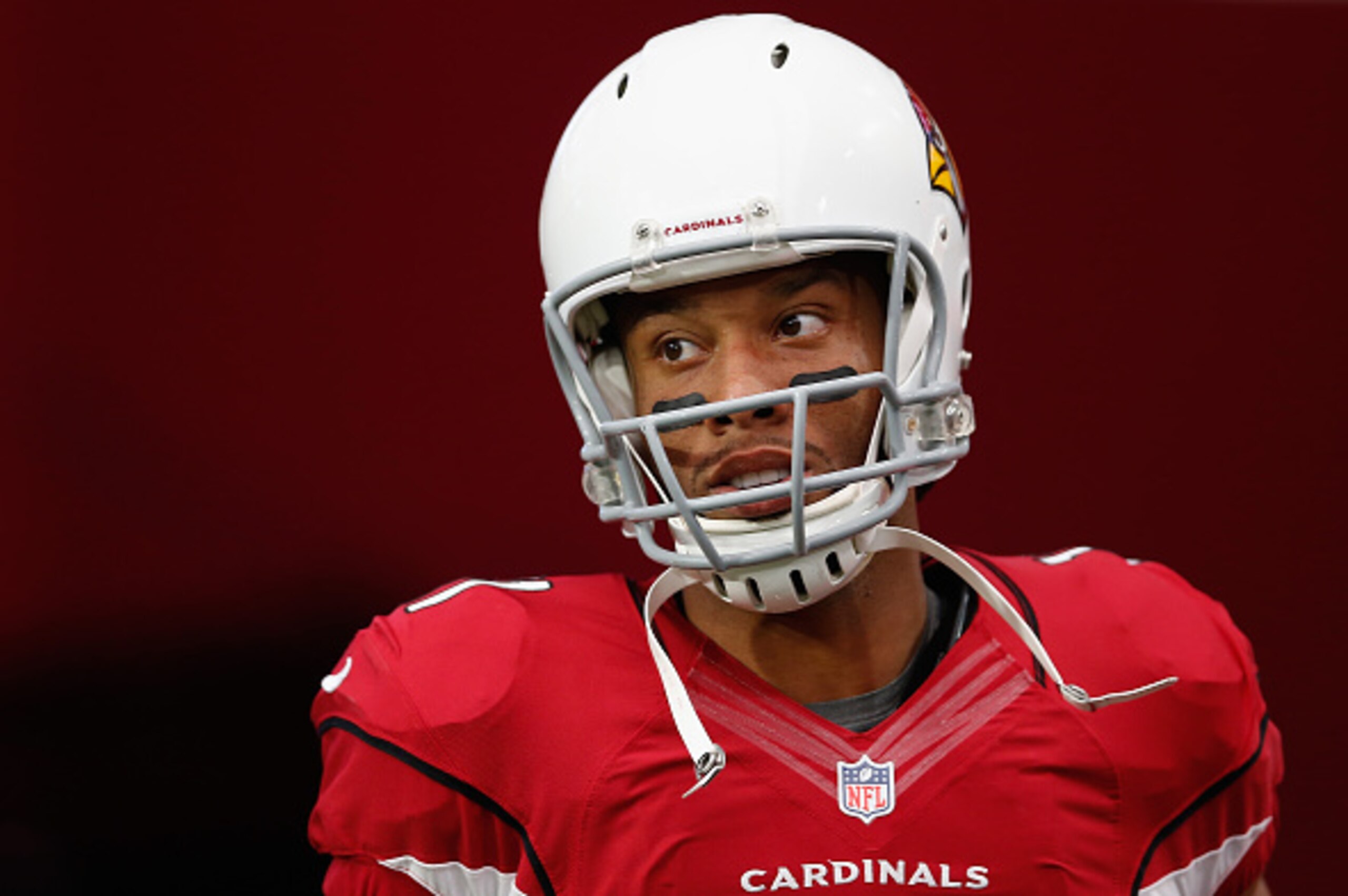 GLENDALE, AZ - NOVEMBER 09:  Wide receiver Larry Fitzgerald #11 of the Arizona Cardinals warms up before the NFL game against the St. Louis Rams at the University of Phoenix Stadium on November 9, 2014 in Glendale, Arizona.The Cardinals defeated the Rams 
