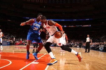 BROOKLYN, NY - MARCH 9: Amar'e Stoudemire #1 of the New York Knicks drives against the Philadelphia 76ers on March 9, 2014 at the Barclays Center in Brooklyn, New York. NOTE TO USER: User expressly acknowledges and agrees that, by downloading and or using