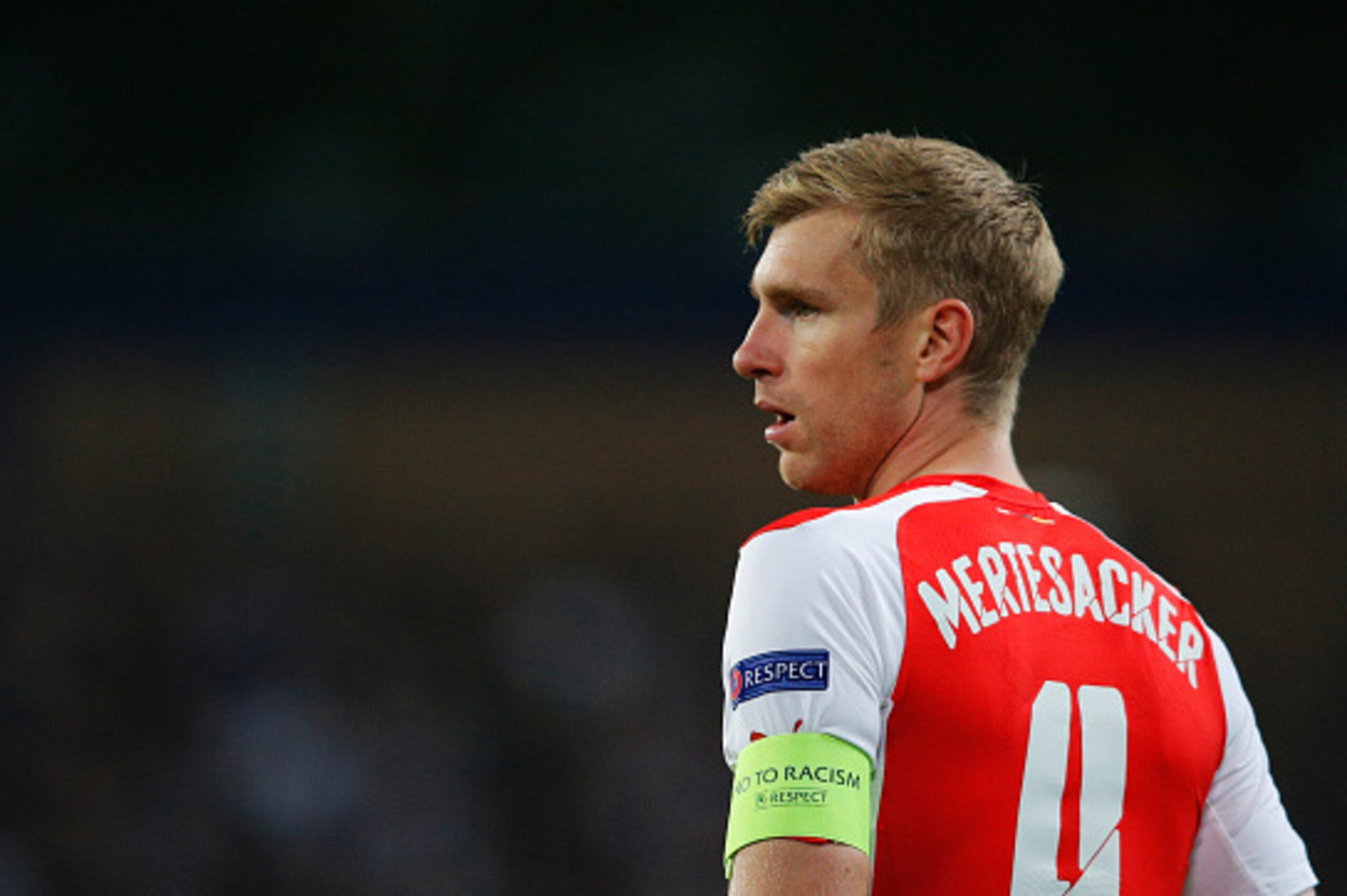 BRUSSELS, BELGIUM - OCTOBER 22:  Per Mertesacker of Arsenal looks on during the UEFA Champions League Group D match between RSC Anderlecht and Arsenal at Constant Vanden Stock Stadium on October 22, 2014 in Brussels, Belgium.  (Photo by Dean Mouhtaropoulo