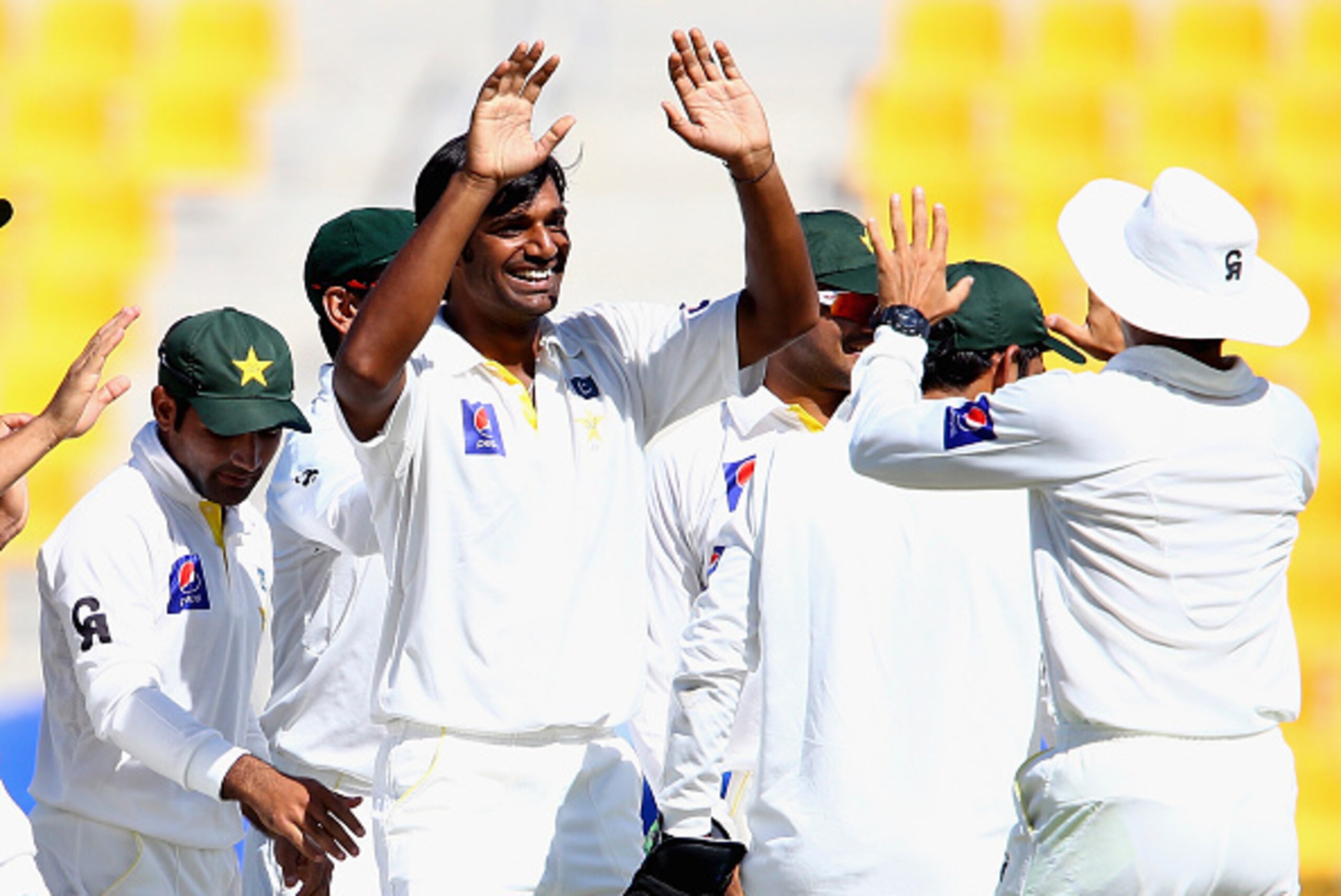 ABU DHABI, UNITED ARAB EMIRATES - NOVEMBER 11: Rahat Ali of Pakistan celebrates with teammates after dismissing Kane Williamson during Day Three of the First Test between Pakistan and New Zealand at Sheikh Zayed stadium on November 11, 2014 in Abu Dhabi, ABU DHABI, UNITED ARAB EMIRATES - NOVEMBER 11: Rahat Ali of Pakistan celebrates with teammates after dismissing Kane Williamson during Day Three of the First Test between Pakistan and New Zealand at Sheikh Zayed stadium on November 11, 2014 in Abu Dhabi,