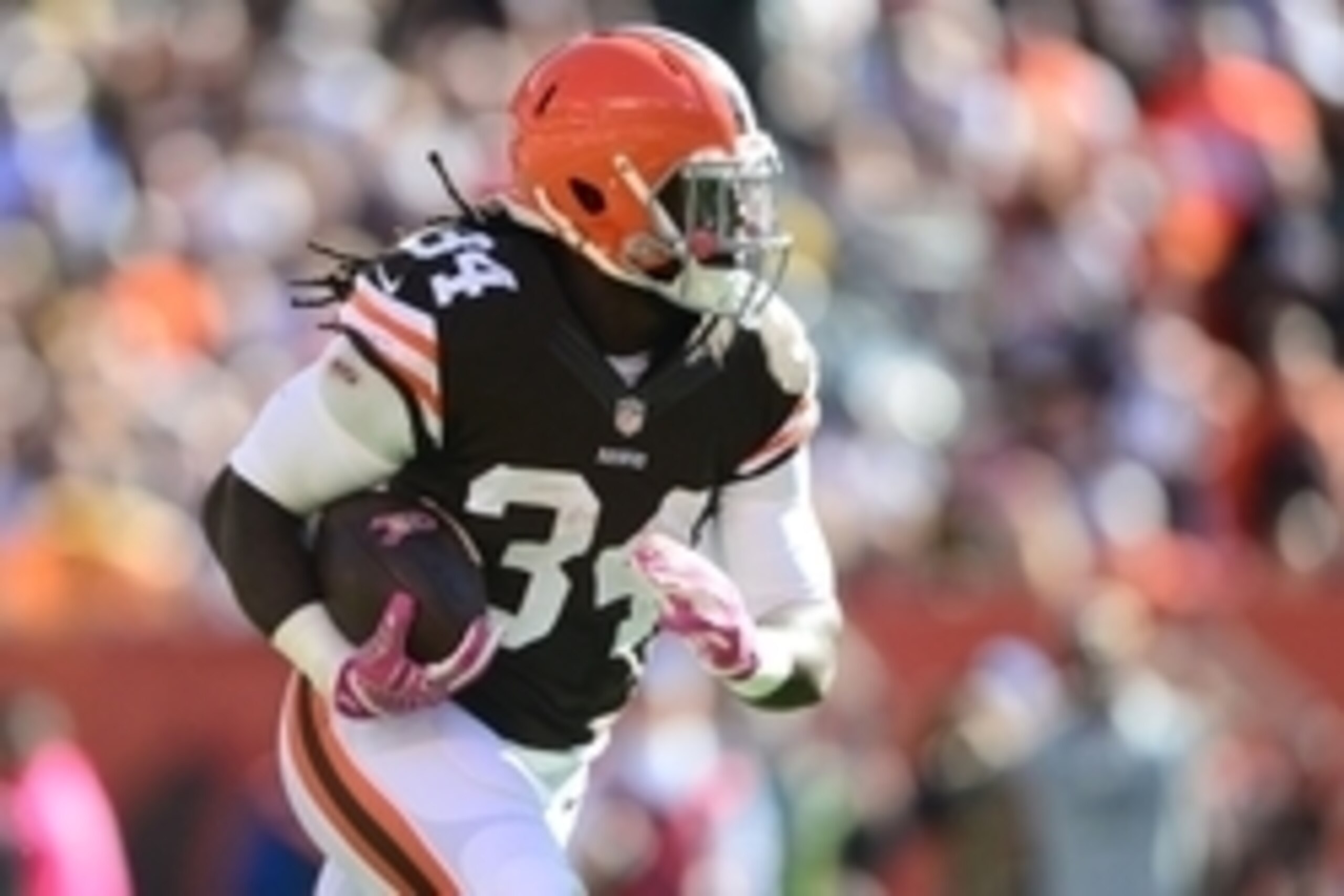 Oct 12, 2014; Cleveland, OH, USA; Cleveland Browns running back Isaiah Crowell (34) runs with the ball during the third quarter against the Pittsburgh Steelers at FirstEnergy Stadium. Mandatory Credit: Andrew Weber-USA TODAY Sports