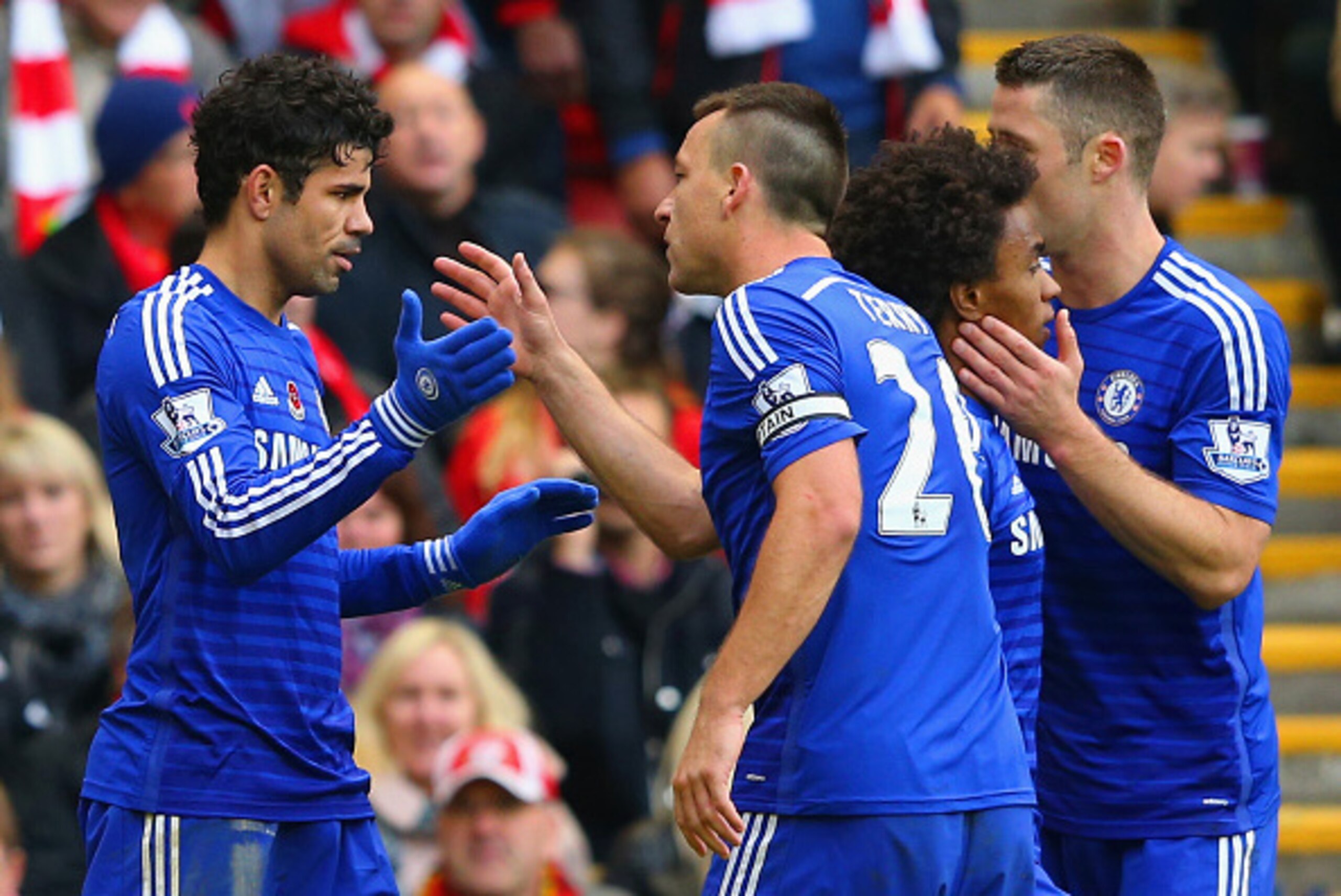 LIVERPOOL, ENGLAND - NOVEMBER 08:  Diego Costa of Chelsea celebrates scoring their second goal with John Terry of Chelsea during the Barclays Premier League match between Liverpool and Chelsea at Anfield on November 8, 2014 in Liverpool, England.  (Photo 