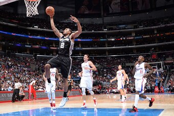 LOS ANGELES, CA - NOVEMBER 10: Kawhi Leonard #2 of the San Antonio Spurs goes for the dunk against the Los Angeles Clippers during the game on November 10, 2014 at STAPLES CENTER in Los Angeles, California. NOTE TO USER: User expressly acknowledges and ag