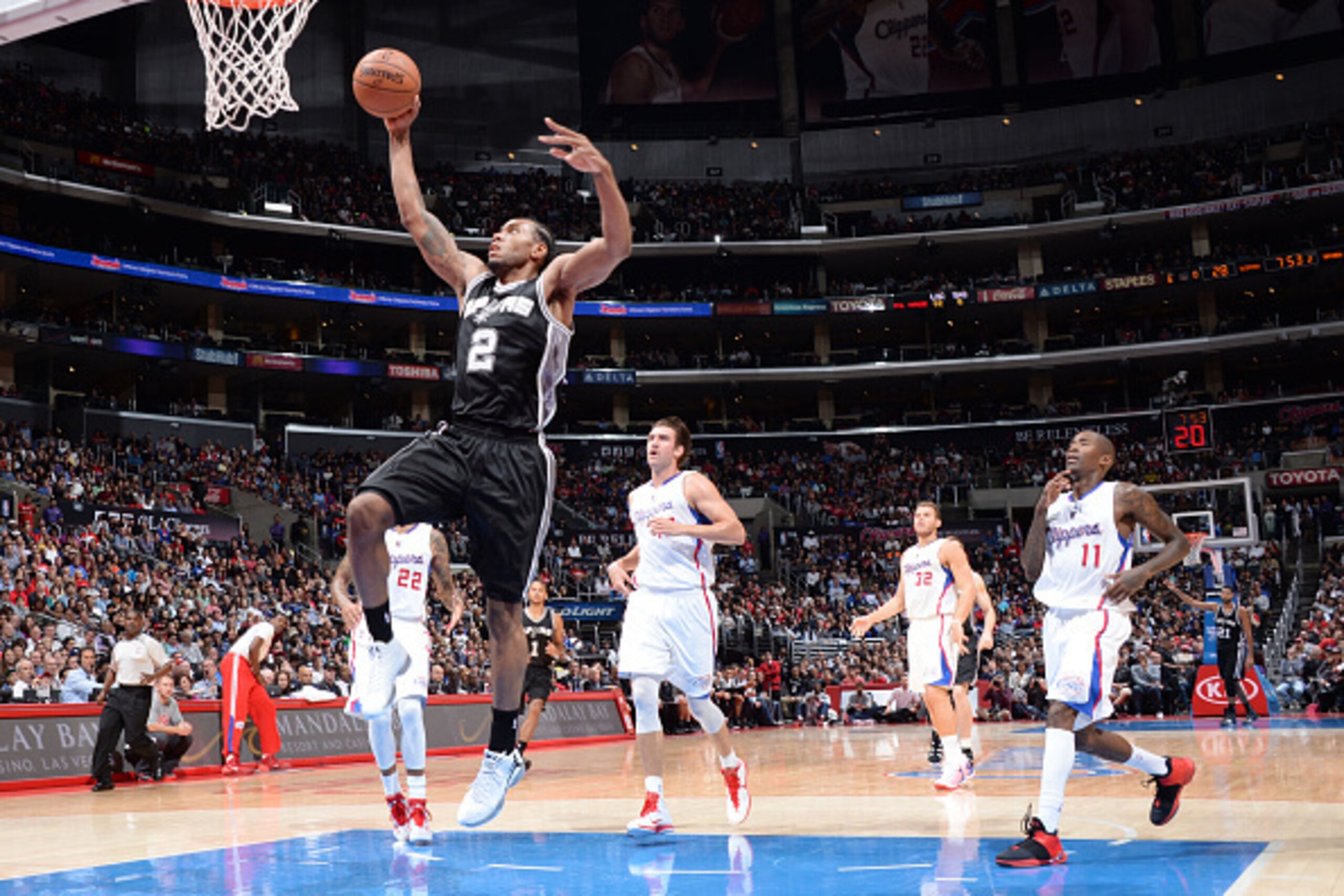 LOS ANGELES, CA - NOVEMBER 10: Kawhi Leonard #2 of the San Antonio Spurs goes for the dunk against the Los Angeles Clippers during the game on November 10, 2014 at STAPLES CENTER in Los Angeles, California. NOTE TO USER: User expressly acknowledges and ag