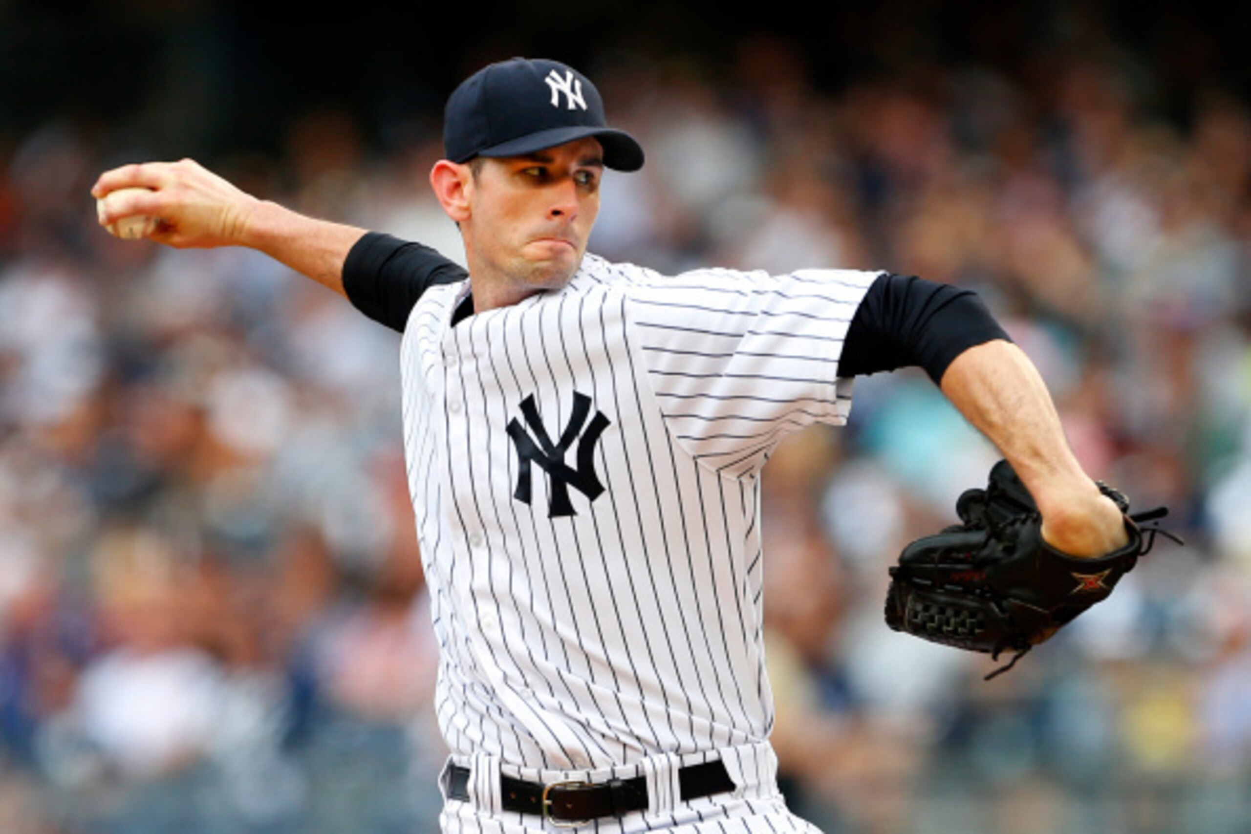 NEW YORK, NY - SEPTEMBER 06: Brandon McCarthy #38 of the New York Yankees delivers a pitch against the Kansas City Royals during the first inning of a MLB baseball game at Yankee Stadium on September 6, 2014 in the Bronx borough of New York City. (Photo b