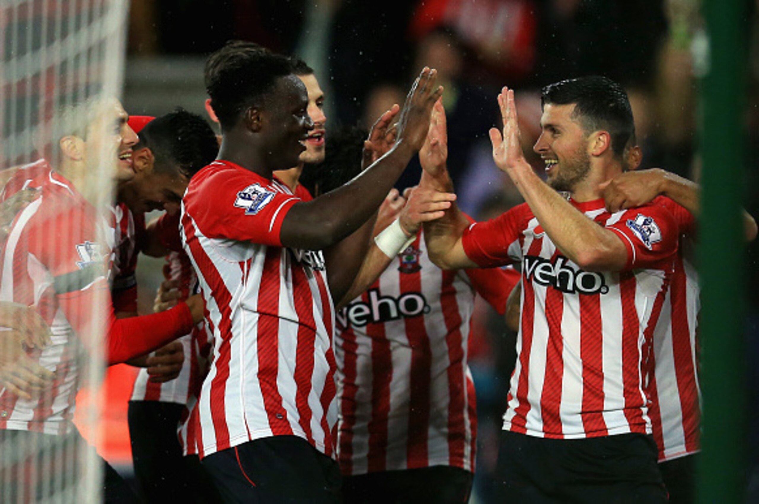 SOUTHAMPTON, ENGLAND - NOVEMBER 08:  Shane Long of Southampton celebrates scoring a goal with Victor Wanyama of Southampton during the Barclays Premier League match between Southampton and Leicester City at St Mary's Stadium on November 8, 2014 in Southam