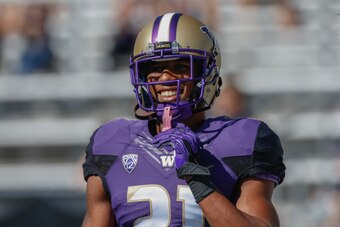SEATTLE, WA - SEPTEMBER 06:  Marcus Peters #21 of the Washington Huskies looks on prior to the game against the Eastern Washington Eagles on September 6, 2014 at Husky Stadium in Seattle, Washington.  (Photo by Otto Greule Jr/Getty Images)