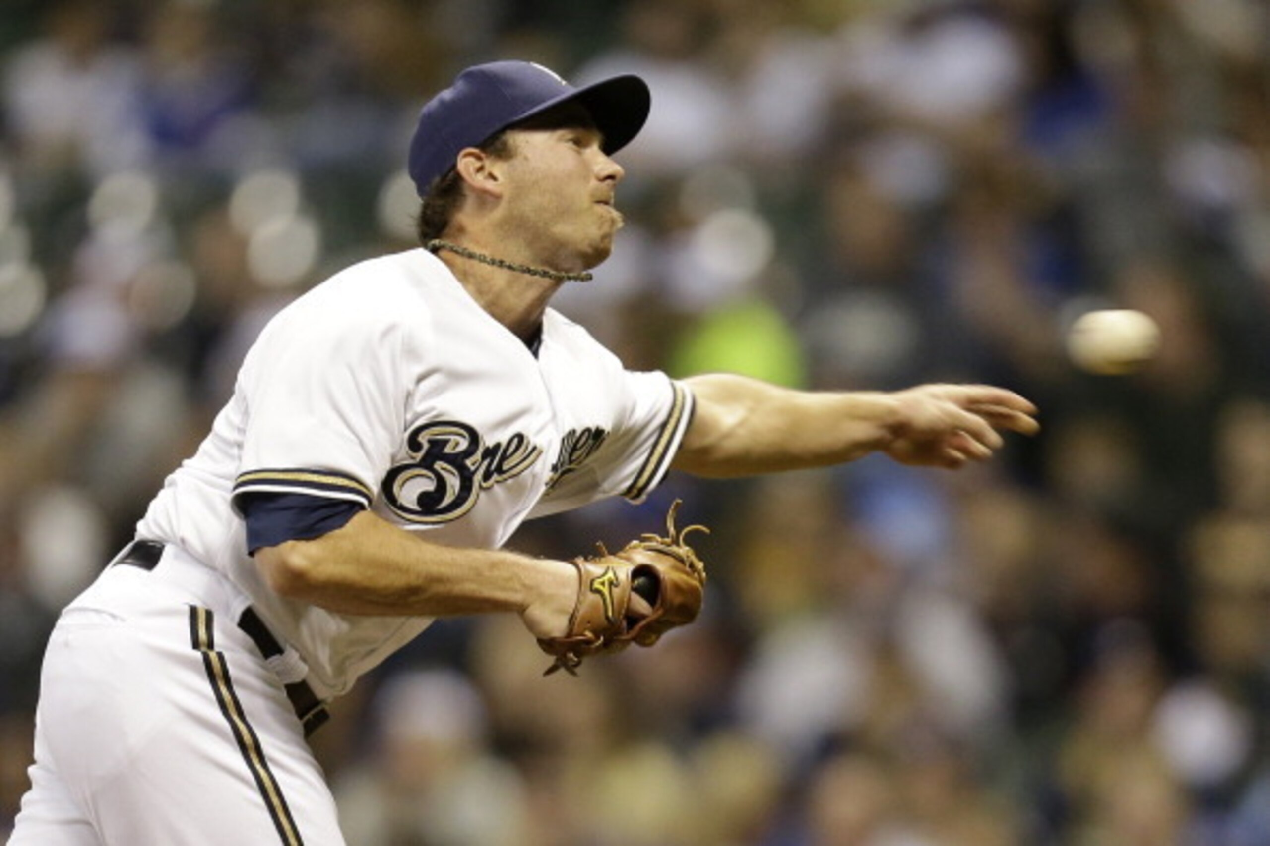 MILWAUKEE, WI - APRIL 25: Zach Duke #59 of the Milwaukee Brewers pitches during the top of the eighth inning against the Chicago Cubs at Miller Park on April 25, 2014 in Milwaukee, Wisconsin. (Photo by Mike McGinnis/Getty Images)