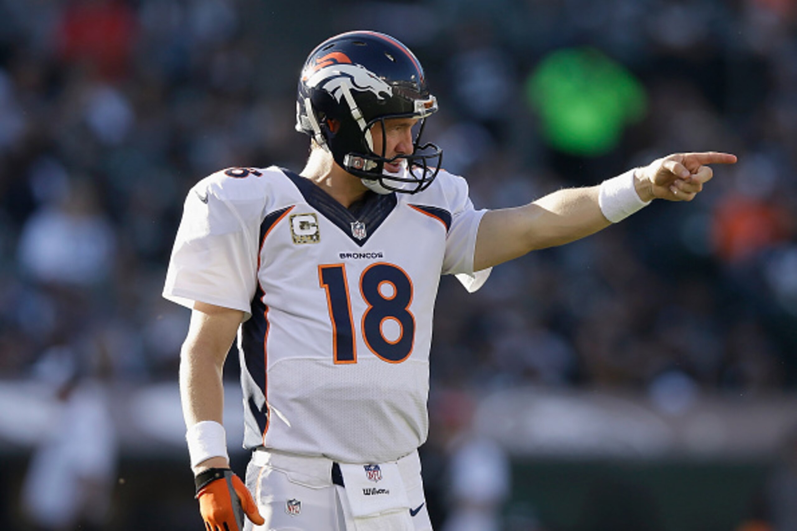 OAKLAND, CA - NOVEMBER 09: Peyton Manning #18 of the Denver Broncos commands his team in the third quarter against the Oakland Raiders at O.co Coliseum on November 9, 2014 in Oakland, California.  (Photo by Ezra Shaw/Getty Images)