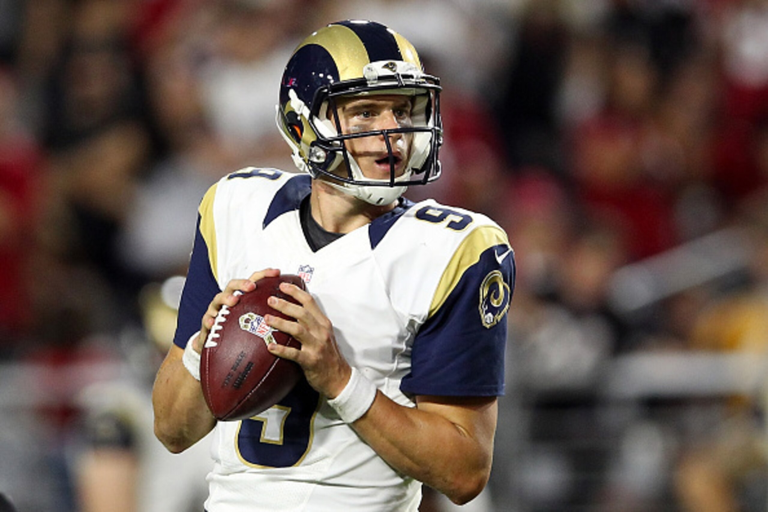 GLENDALE, AZ - NOVEMBER 09:  Quarterback Austin Davis #9 of the St. Louis Rams drops back to pass during the NFL game against the Arizona Cardinals at the University of Phoenix Stadium on November 9, 2014 in Glendale, Arizona. The Cardinals defeated the R