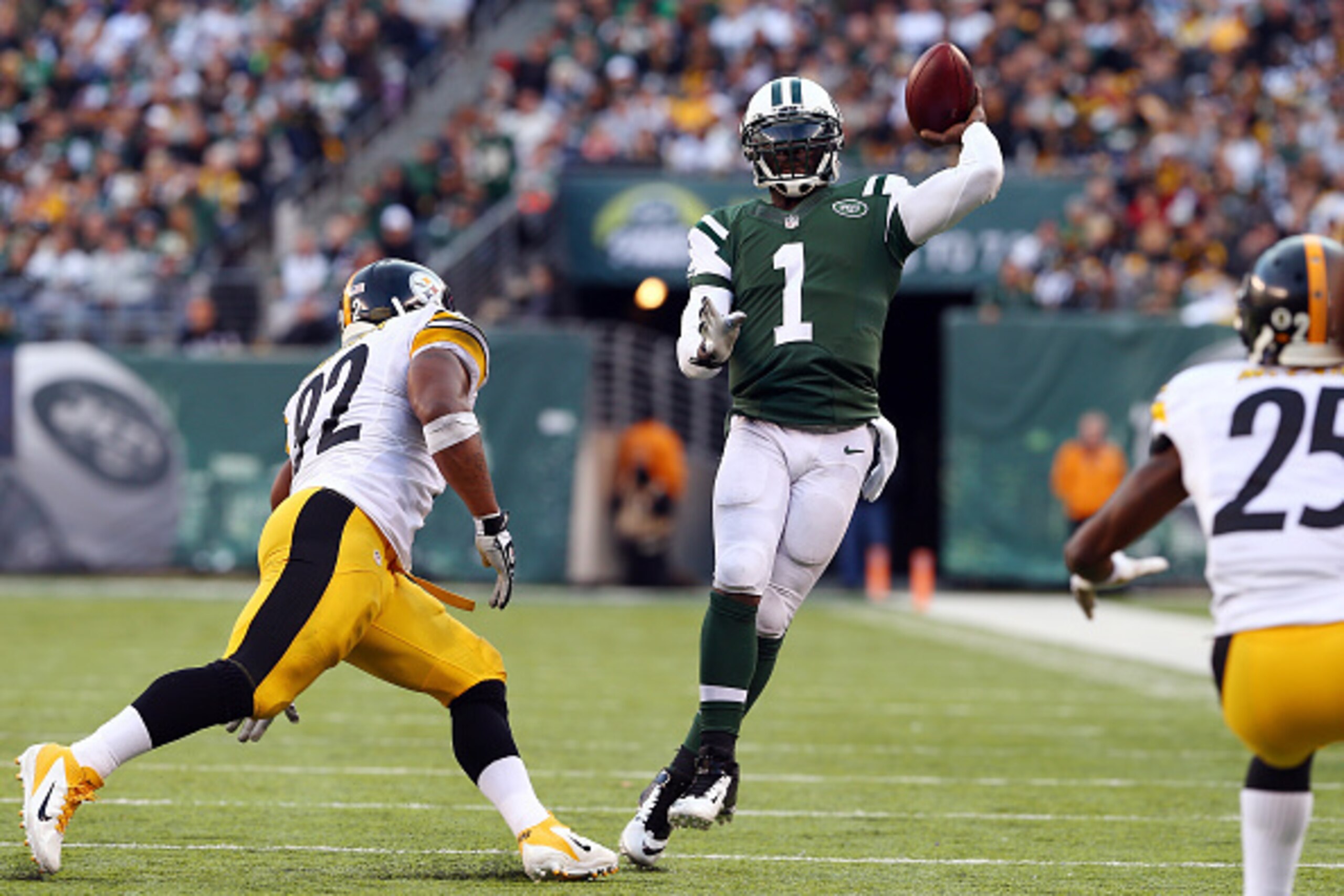EAST RUTHERFORD, NJ - NOVEMBER 09:  Quarterback Michael Vick #1 of the New York Jets passes against the Pittsburgh Steelers during a game at MetLife Stadium on November 9, 2014 in East Rutherford, New Jersey.  (Photo by Elsa/Getty Images)