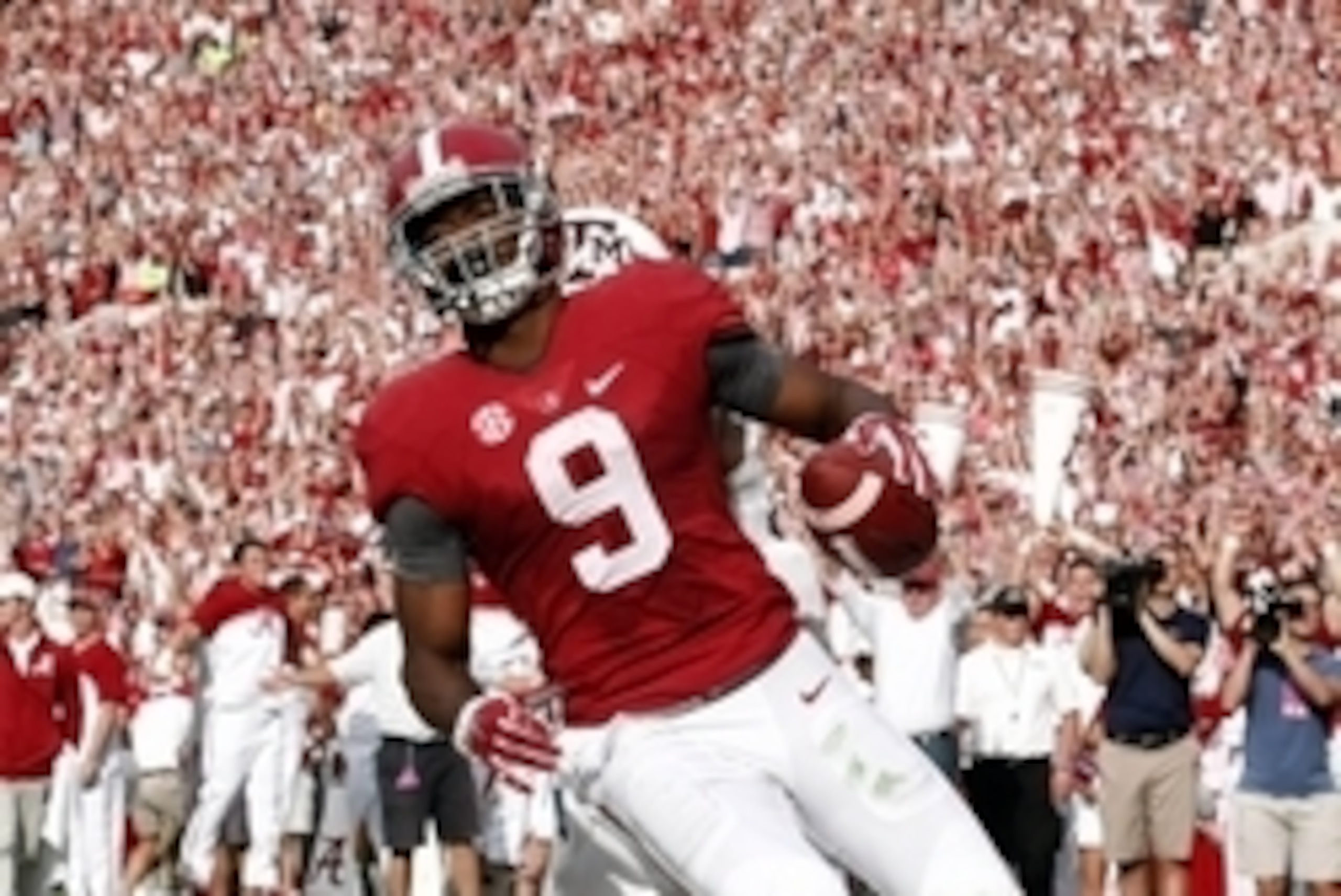 Oct 18, 2014; Tuscaloosa, AL, USA; Alabama Crimson Tide wide receiver Amari Cooper (9) catches a pass for a touchdown against the Texas A&M Aggies at Bryant-Denny Stadium. Mandatory Credit: Marvin Gentry-USA TODAY Sports