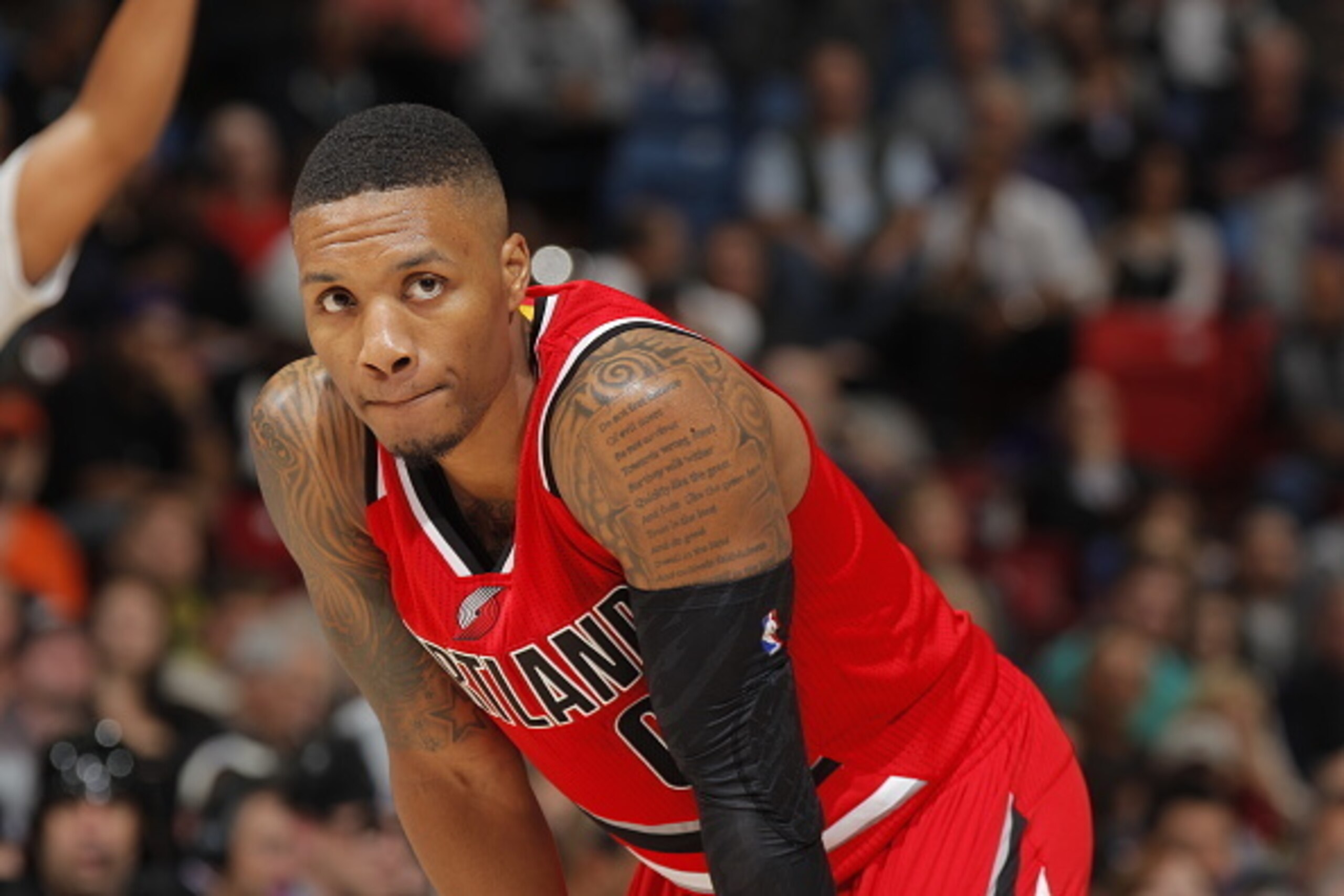 SACRAMENTO, CA - OCTOBER 31: Damian Lillard #0 of the Portland Trail Blazers looks on during the game against the Sacramento Kings on October 31, 2014 at Sleep Train Arena in Sacramento, California. NOTE TO USER: User expressly acknowledges and agrees tha