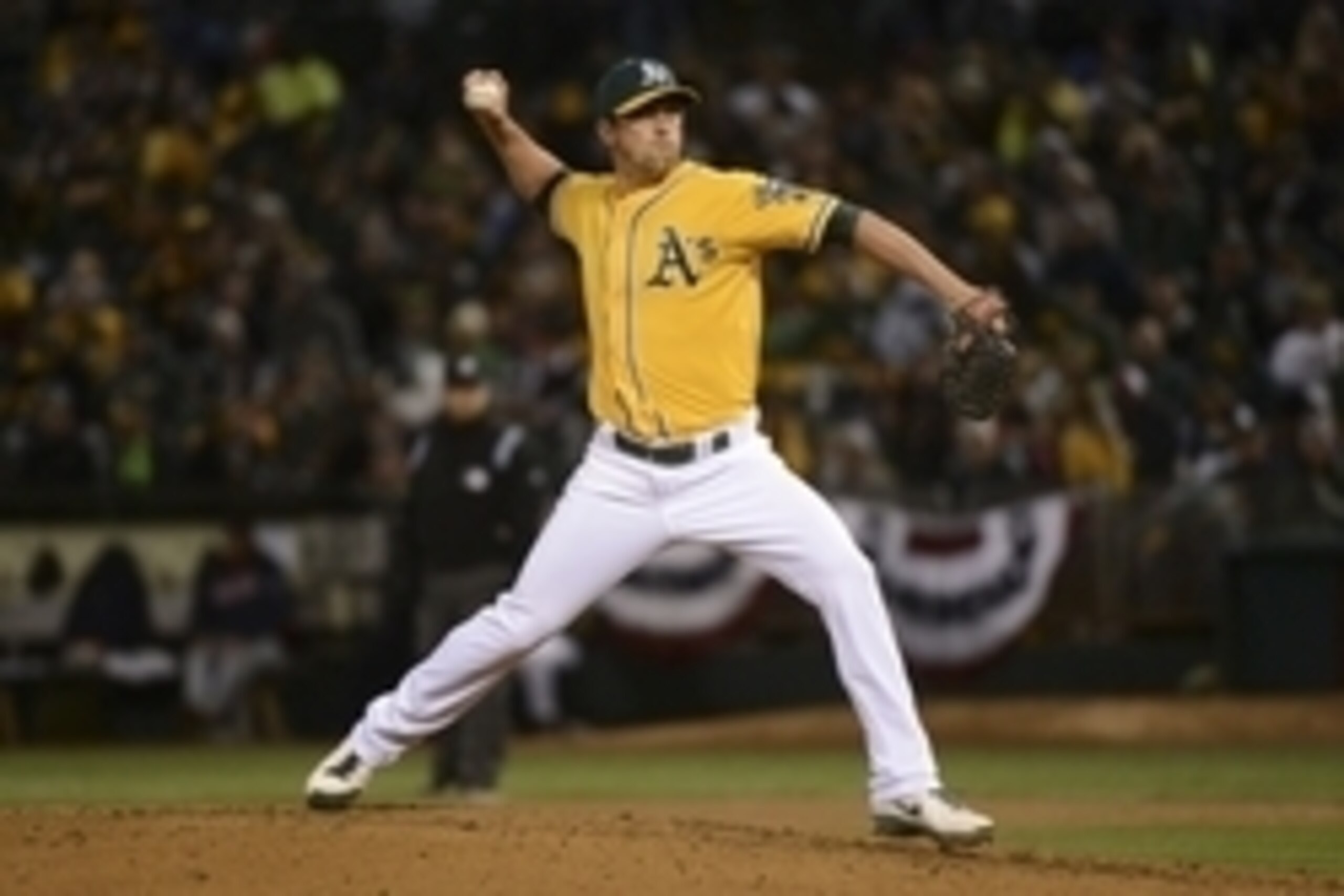 March 31, 2014; Oakland, CA, USA; Oakland Athletics relief pitcher Luke Gregerson (44) delivers a pitch against the Cleveland Indians in the seventh inning of an opening day baseball game at O.co Coliseum. The Indians defeated the Athletics 2-0. Mandatory