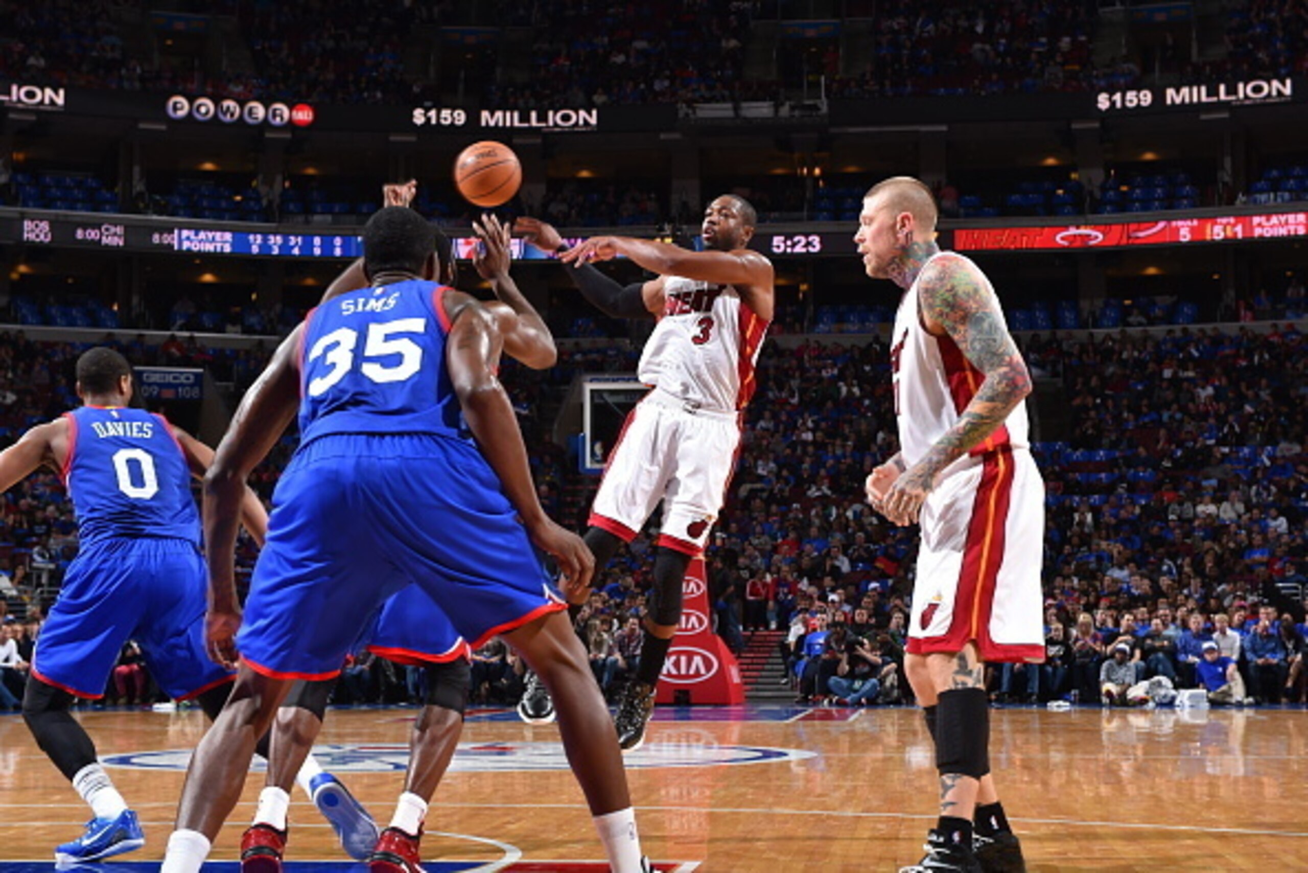 PHILADELPHIA, PA - NOVEMBER 1: Dwyane Wade #3 of the Miami Heat passes the ball against the Philadelphia 76ers during the game on November 1, 2014 at the Wells Fargo Center in Philadelphia, Pennsylvania. NOTE TO USER: User expressly acknowledges and agree