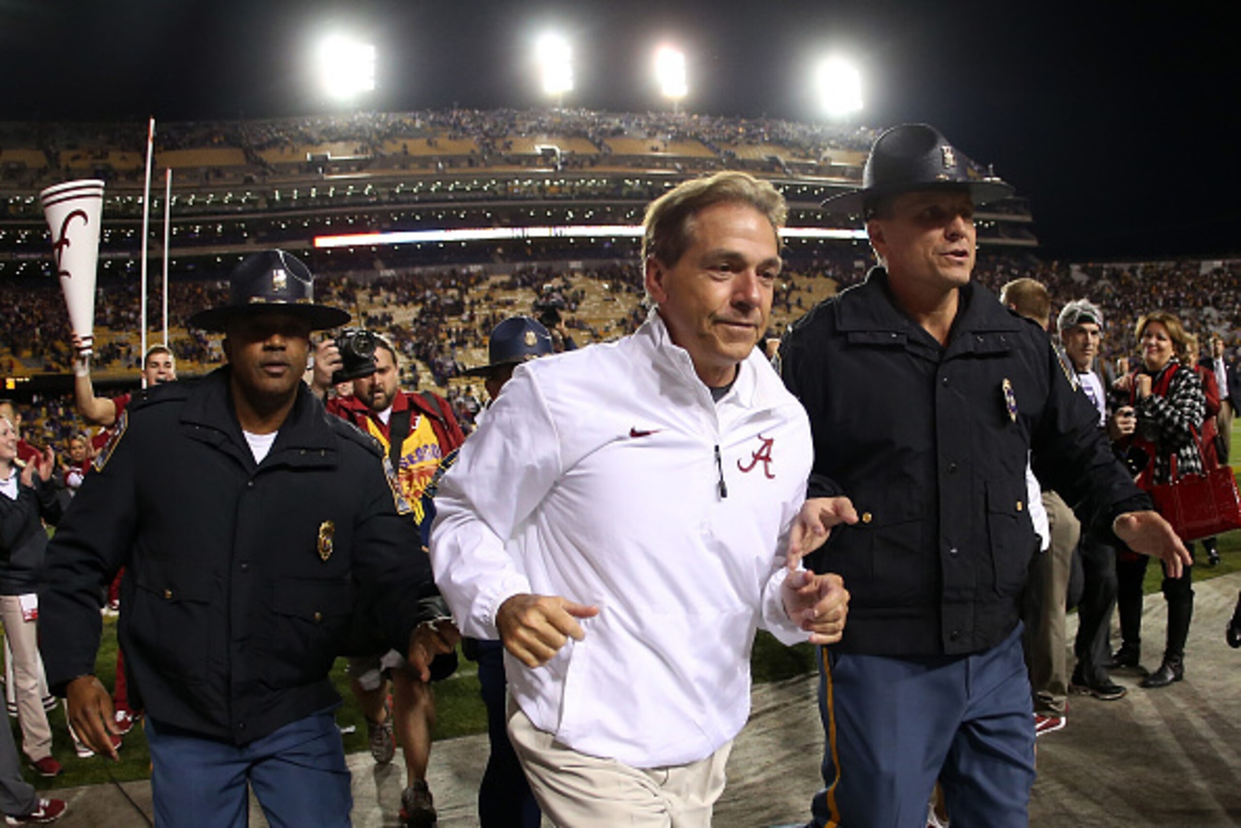 BATON ROUGE, LA - NOVEMBER 08:  Head coach Nick Saban of the Alabama Crimson Tide walks off the field after defeating the LSU Tigers in overtime at Tiger Stadium on November 8, 2014 in Baton Rouge, Louisiana.  (Photo by Chris Graythen/Getty Images)