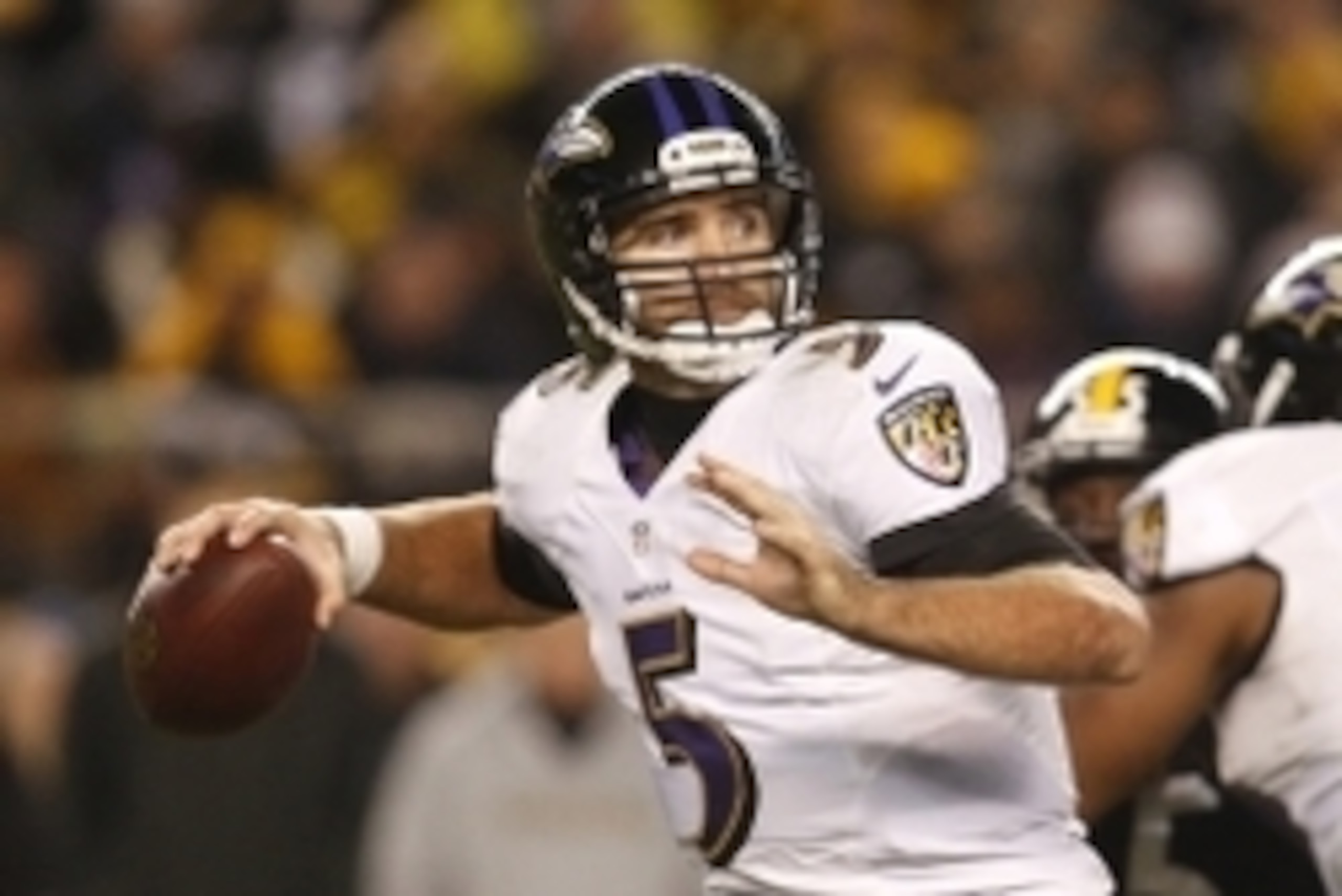 Nov 2, 2014; Pittsburgh, PA, USA; Baltimore Ravens quarterback Joe Flacco (5) passes the ball against the Pittsburgh Steelers during the third quarter at Heinz Field. The Steelers won 43-23. Mandatory Credit: Charles LeClaire-USA TODAY Sports