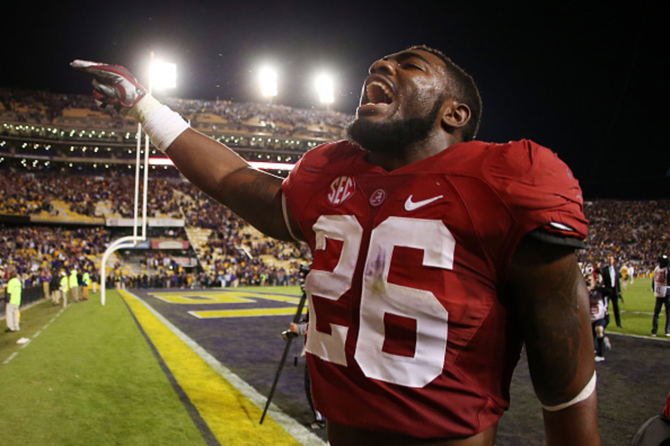 BATON ROUGE, LA - NOVEMBER 08: Members of the Alabama Crimson Tide celebrate after winning in overtime against the LSU Tigers at Tiger Stadium on November 8, 2014 in Baton Rouge, Louisiana. (Photo by Chris Graythen/Getty Images) BATON ROUGE, LA - NOVEMBER 08: Members of the Alabama Crimson Tide celebrate after winning in overtime against the LSU Tigers at Tiger Stadium on November 8, 2014 in Baton Rouge, Louisiana. (Photo by Chris Graythen/Getty Images)