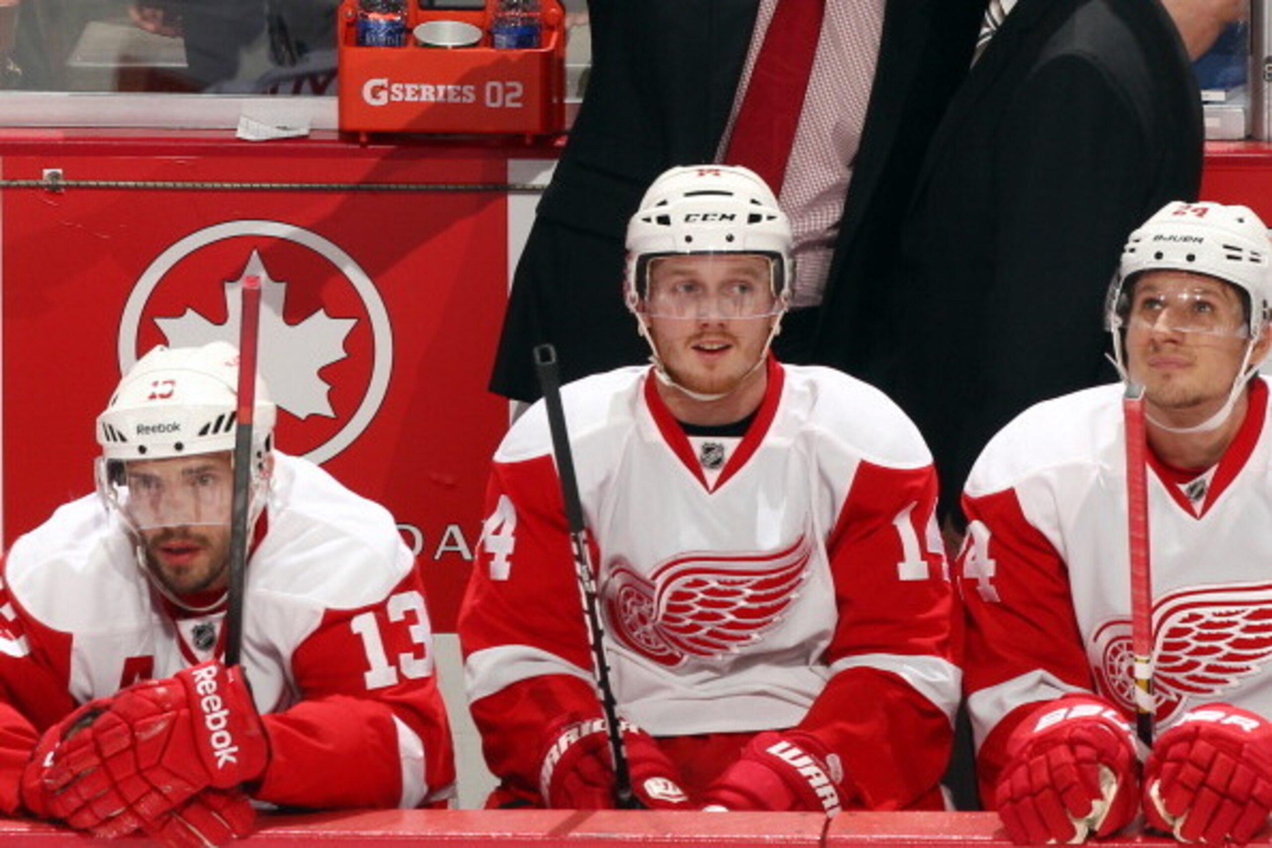 ANAHEIM, CA - MAY 12: Detroit Red Wings head coach Mike Babcock talks with associate coach Tom Renny during the game as Pavel Datsyuk #13, Gustav Nyquist #14 and Damien Brunner #24 look on from the bench against the Anaheim Ducks in Game Seven of the Wes ANAHEIM, CA - MAY 12: Detroit Red Wings head coach Mike Babcock talks with associate coach Tom Renny during the game as Pavel Datsyuk #13, Gustav Nyquist #14 and Damien Brunner #24 look on from the bench against the Anaheim Ducks in Game Seven of the Wes
