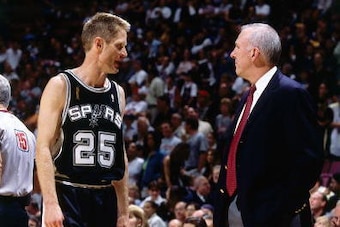 EAST RUTHERFORD, NJ - JUNE 13:  Steve Kerr #25 of the San Antonio Spurs speaks with head coach Gregg Popovich during Game five of the NBA Finals at Continental Airlines Arena on June 13, 2003 in East Rutherford, New Jersey.  The Spurs won 93-83.  NOTE TO
