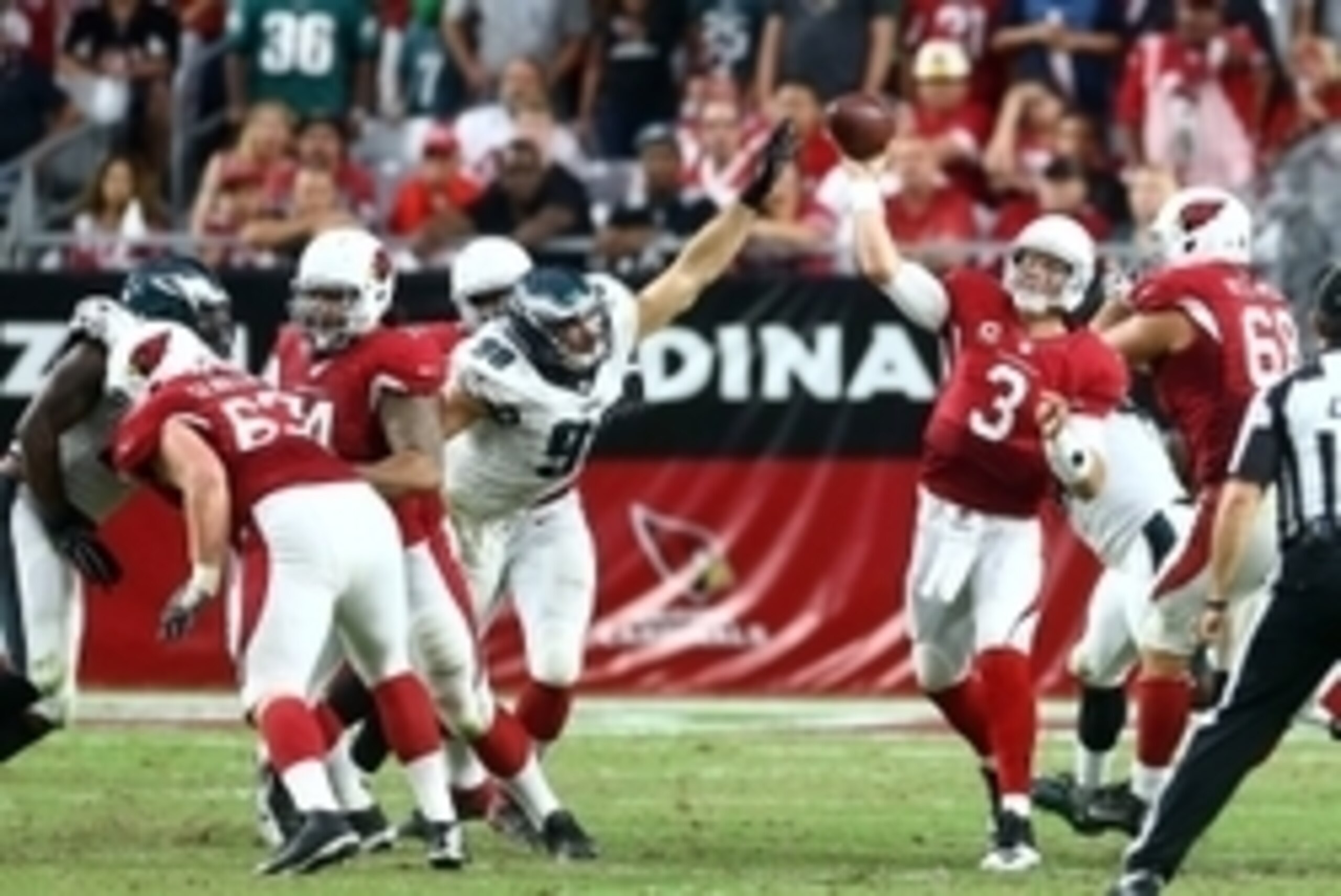 Oct 26, 2014; Glendale, AZ, USA; Philadelphia Eagles linebacker Connor Barwin (98) pressures Arizona Cardinals quarterback Carson Palmer (3) as he throws a pass at University of Phoenix Stadium. The Cardinals defeated the Eagles 24-20. Mandatory Credit: M