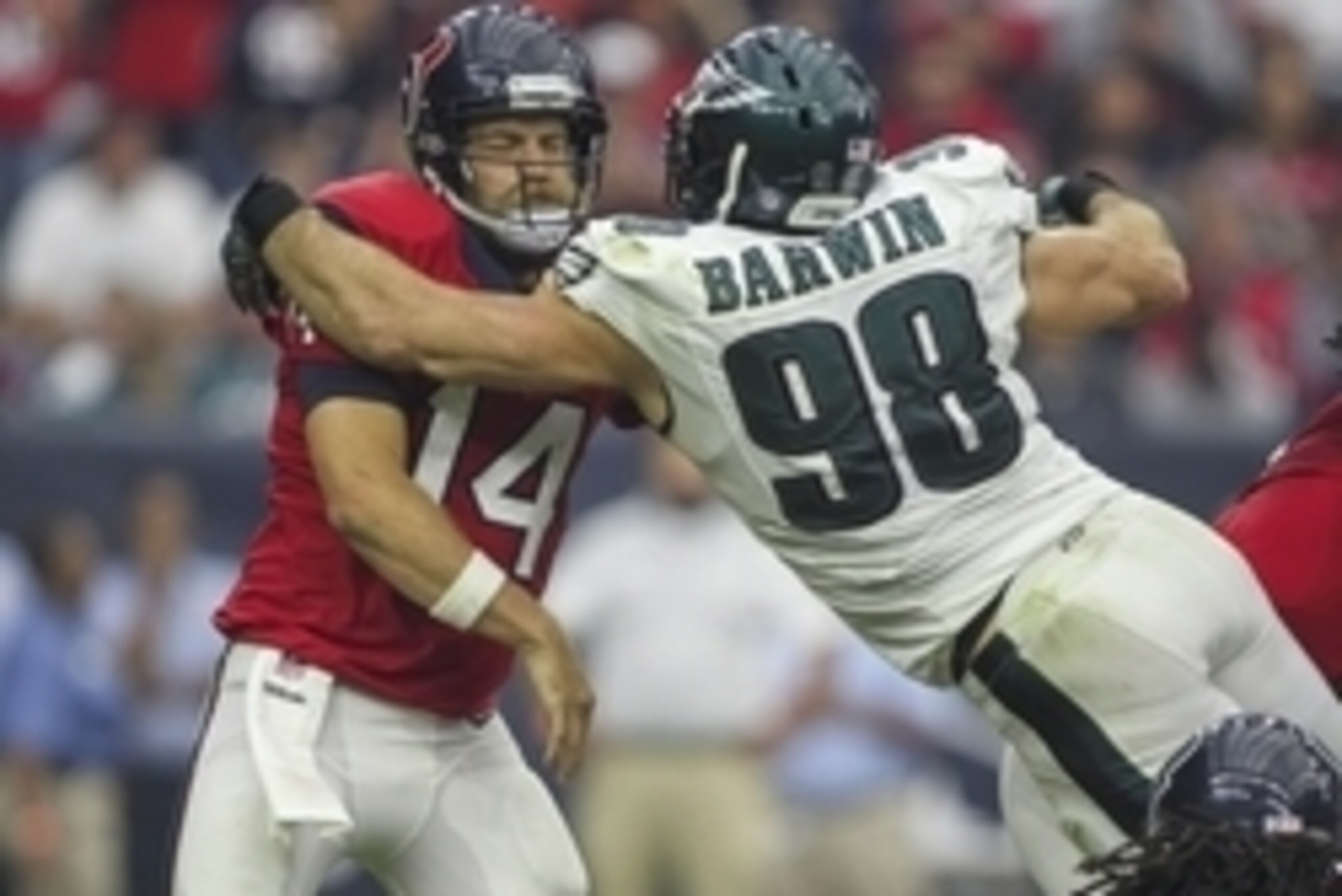 Nov 2, 2014; Houston, TX, USA; Philadelphia Eagles outside linebacker Connor Barwin (98) applies pressure to Houston Texans quarterback Ryan Fitzpatrick (14) during the third quarter at NRG Stadium. The Eagles defeated the Texans 31-21. Mandatory Credit: 