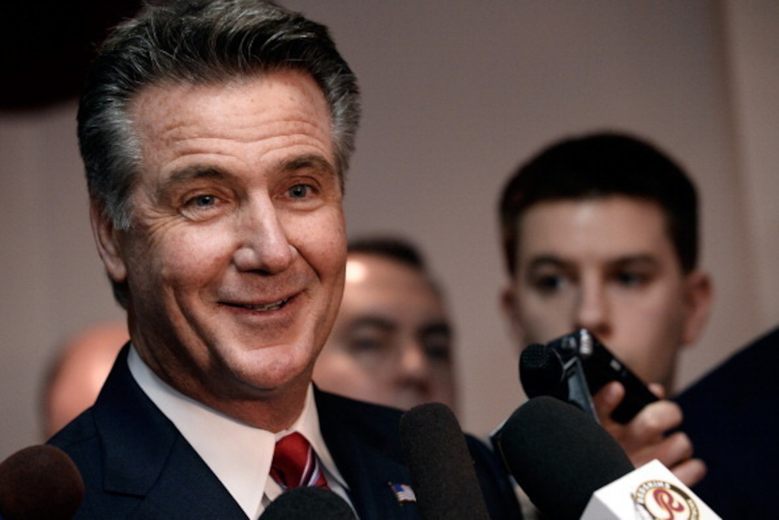 ASHBURN, VA - JANUARY 09:  Washington Redskins Executive Vice President and General Manager Bruce Allen speaks to members of the media after Jay Gruden was introduced as the new head coach of the Washington Redskins during a press conference at Redskins P