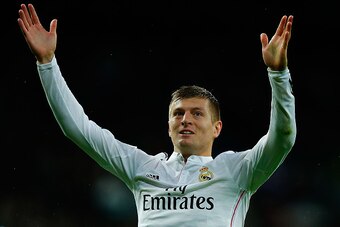MADRID, SPAIN - NOVEMBER 08:  Toni Kroos of Real Madrid CF celebrates scoring their third goal during the La Liga match between Real Madrid CF and Rayo Vallecano de Madrid at Estadio Santiago Bernabeu on November 8, 2014 in Madrid, Spain.  (Photo by Gonza