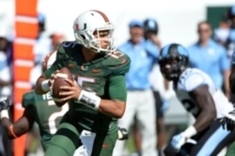 Nov 1, 2014; Miami Gardens, FL, USA; Miami Hurricanes quarterback Brad Kaaya (15) throws a pass against the North Carolina Tar Heels during the second half at Sun Life Stadium. Mandatory Credit: Steve Mitchell-USA TODAY Sports