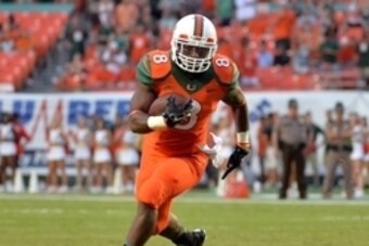 Sep 6, 2014; Miami Gardens, FL, USA; Miami Hurricanes running back Duke Johnson (8) runs against Florida A&M Rattlers defense during the first half at Sun Life Stadium. Mandatory Credit: Steve Mitchell-USA TODAY Sports