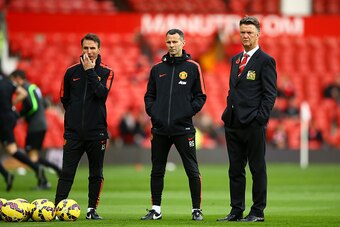 MANCHESTER, ENGLAND - NOVEMBER 08:  Manchester United Manager Louis van Gaal looks on with his Assistants Albert Stuivenberg and Ryan Giggs (R) prior to the Barclays Premier League match between Manchester United and Crystal Palace at Old Trafford on Nove