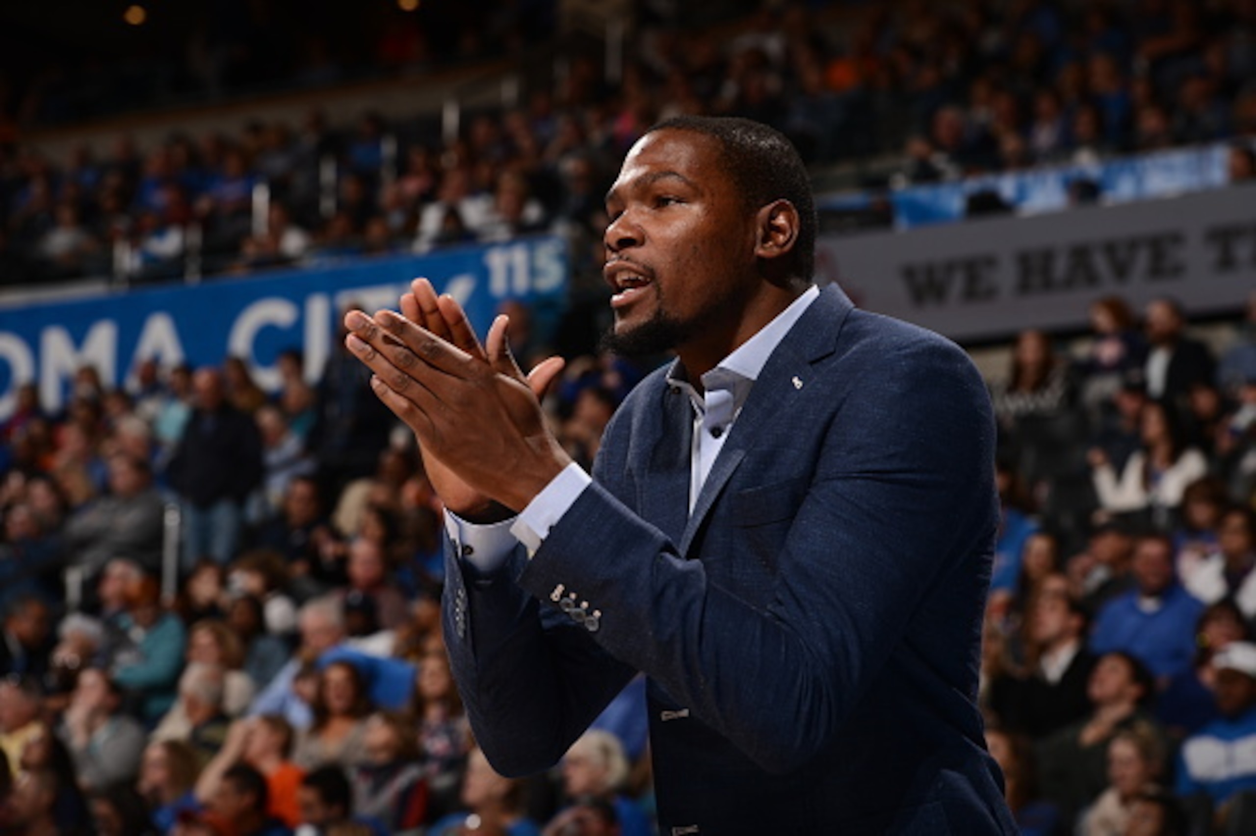 OKLAHOMA CITY, OK - NOVEMBER 1: Kevin Durant #35 of the Oklahoma City Thunder celebrates during the game against the Denver Nuggets at the Chesapeake Energy Arena on November 1, 2014 in Oklahoma City, Oklahoma. NOTE TO USER: User expressly acknowledges an