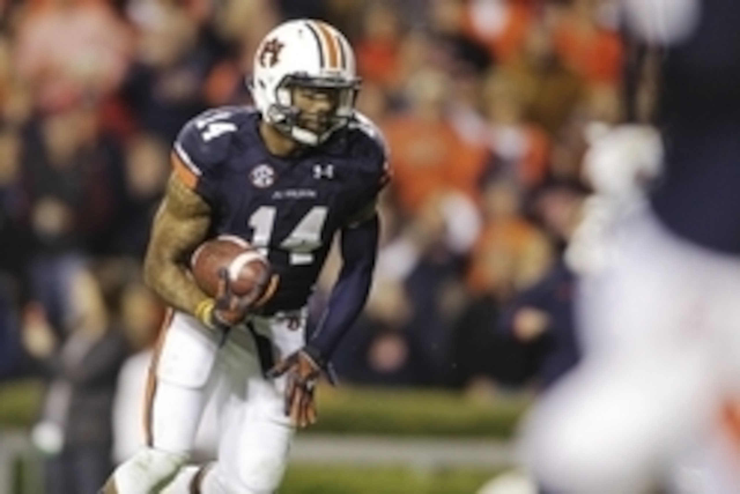 Nov 8, 2014; Auburn, AL, USA; Auburn Tigers quarterback Nick Marshall carries for a touchdown against the Texas A&M Aggies during the second half at Jordan Hare Stadium  The Aggies beat the Tigers 41-38. Mandatory Credit: John Reed-USA TODAY Sports