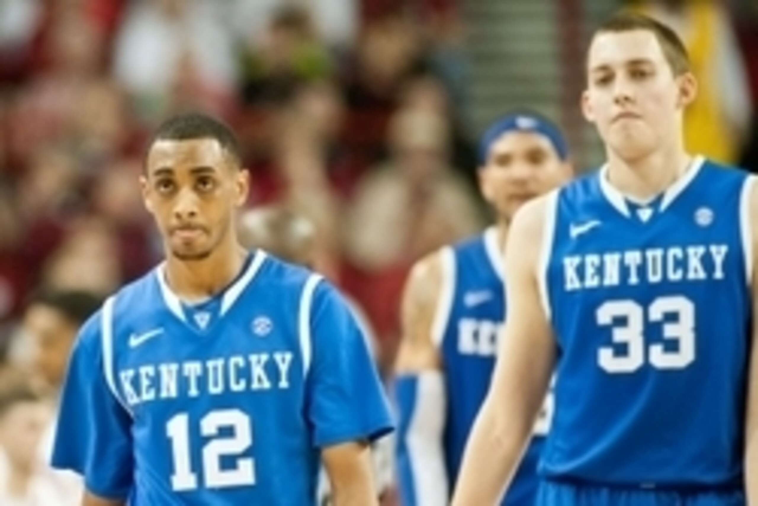 March 2, 2013; Fayetteville, AR, USA; Kentucky Wildcats guard Ryan Harrow (12) and forward Kyle Wiltjer (33) walks off the court during a game against the Arkansas Razorbacks at Bud Walton Arena. Arkansas defeated Kentucky 73-60. Mandatory Credit: Beth H March 2, 2013; Fayetteville, AR, USA; Kentucky Wildcats guard Ryan Harrow (12) and forward Kyle Wiltjer (33) walks off the court during a game against the Arkansas Razorbacks at Bud Walton Arena. Arkansas defeated Kentucky 73-60. Mandatory Credit: Beth H