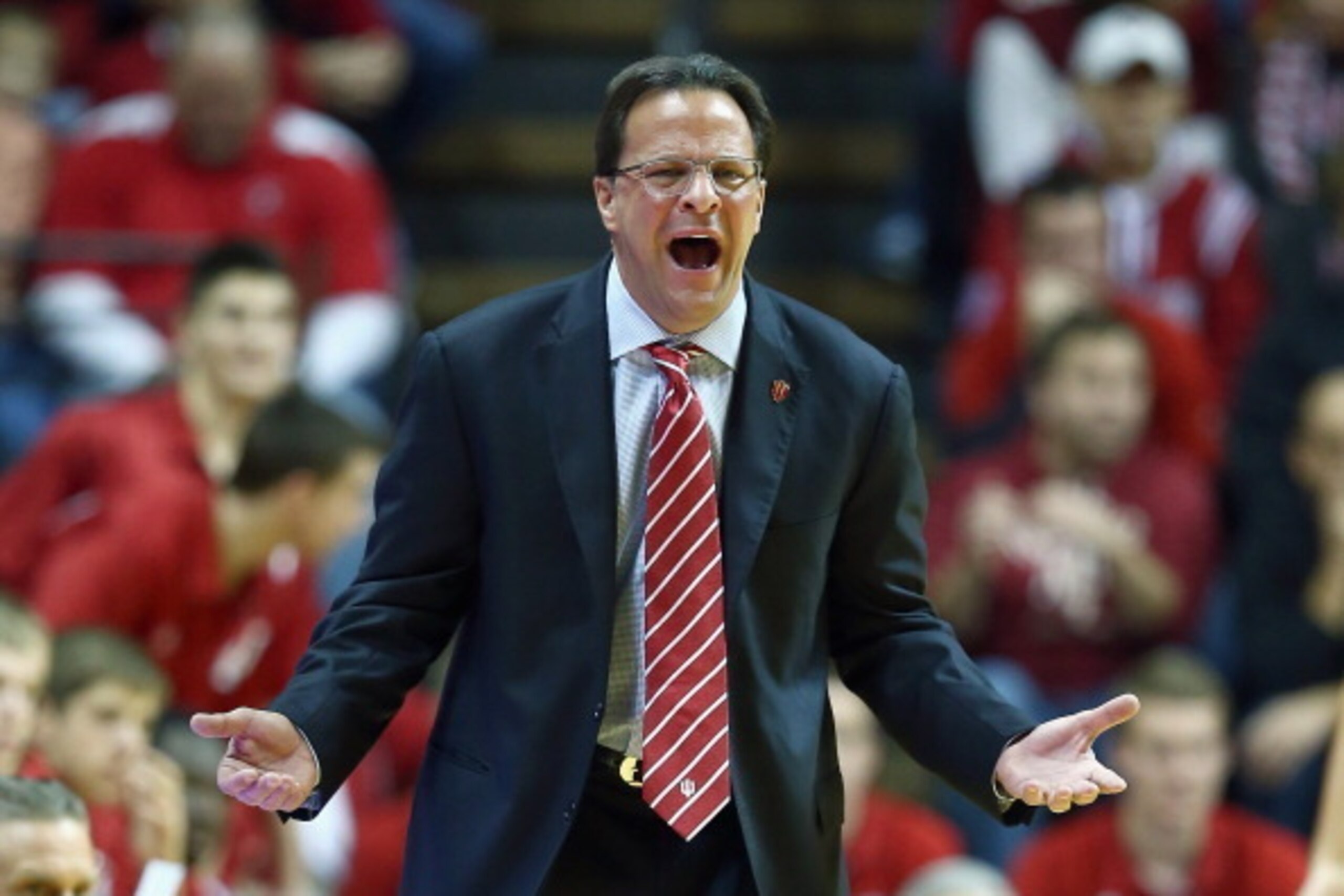 BLOOMINGTON, IN - NOVEMBER 26: Tom Crean the head coach of the Indiana Hoosiers gives instructions to his team during the game against the Evansville Purple Aces at Assembly Hall on November 26, 2013 in Bloomington, Indiana. (Photo by Andy Lyons/Getty I BLOOMINGTON, IN - NOVEMBER 26: Tom Crean the head coach of the Indiana Hoosiers gives instructions to his team during the game against the Evansville Purple Aces at Assembly Hall on November 26, 2013 in Bloomington, Indiana. (Photo by Andy Lyons/Getty I