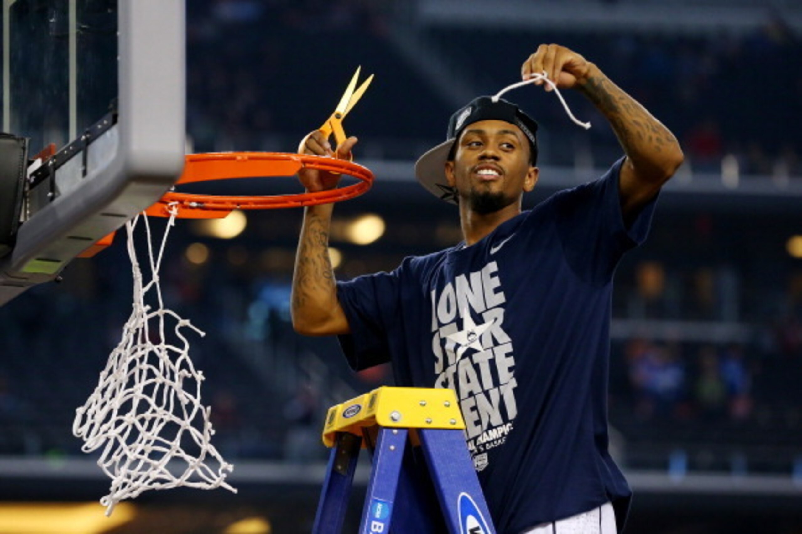 ARLINGTON, TX - APRIL 07: Ryan Boatright #11 of the Connecticut Huskies cuts the net after defeating the Kentucky Wildcats 60-54 in the NCAA Men's Final Four Championship at AT&T Stadium on April 7, 2014 in Arlington, Texas. (Photo by Ronald Martinez/Get ARLINGTON, TX - APRIL 07: Ryan Boatright #11 of the Connecticut Huskies cuts the net after defeating the Kentucky Wildcats 60-54 in the NCAA Men's Final Four Championship at AT&T Stadium on April 7, 2014 in Arlington, Texas. (Photo by Ronald Martinez/Get