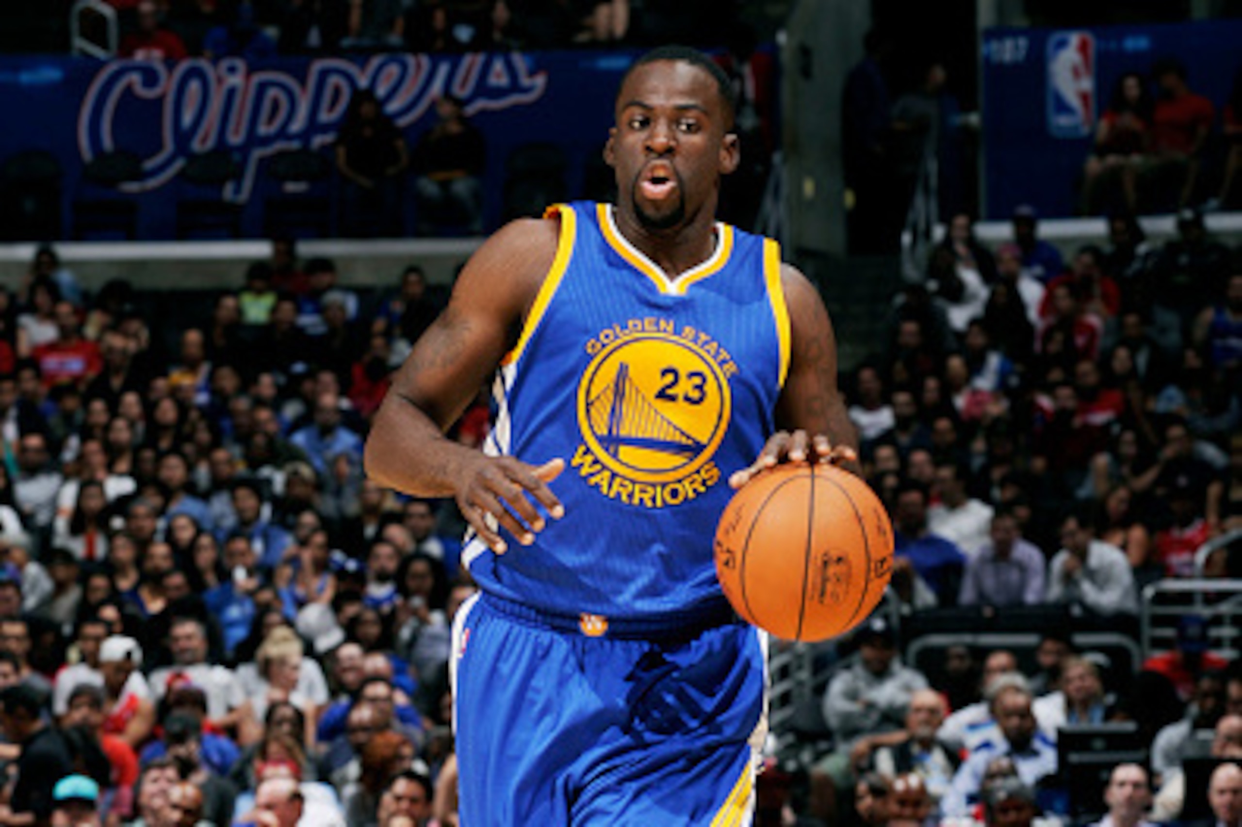 LOS ANGELES, CA - OCTOBER 7: Draymond Green #23 of the Golden State Warriors handles the basketball during a game against the Los Angeles Clippers on October 7, 2014 at the Staples Center in Los Angeles, California. NOTE TO USER:  User expressly acknowled