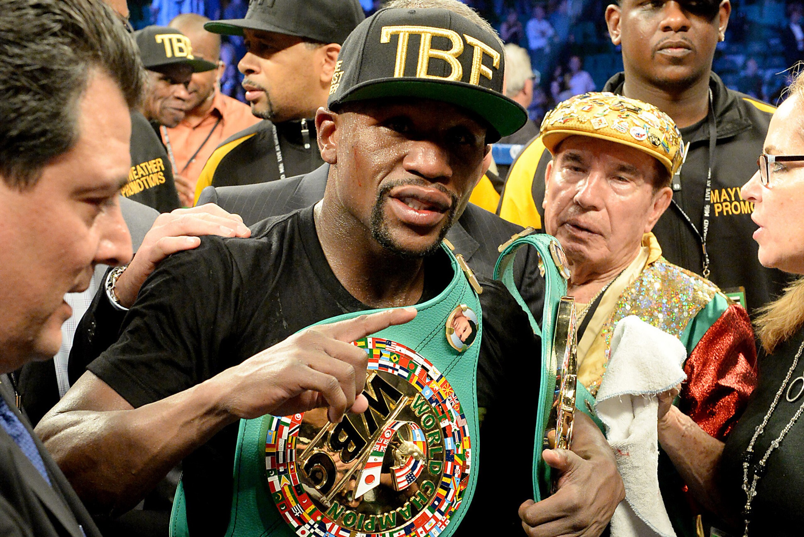 Sep 13, 2014; Las Vegas, NV, USA; Floyd Mayweather celebrates in the ring after defeating Marcos Maidana (not pictured) in their WBC & WBA Welterweight and WBC Superwelter Weight title fight at the MGM Grand Garden Arena. Mandatory Credit: Jayne Kamin-Onc