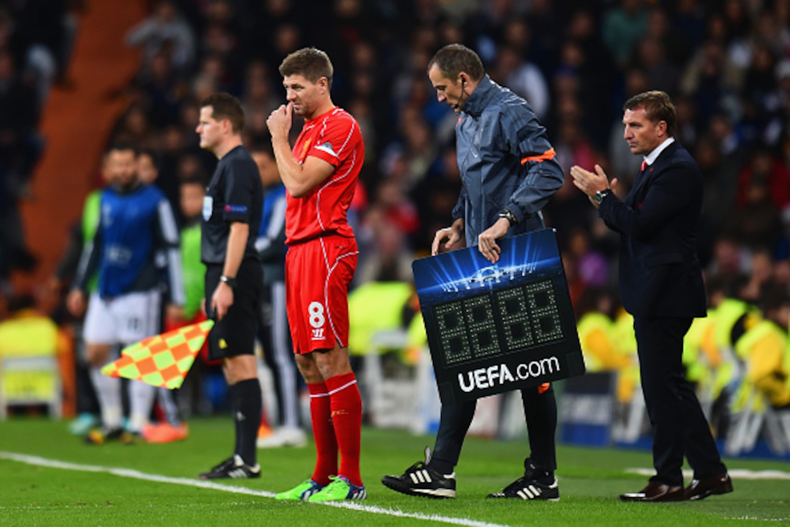 MADRID, SPAIN - NOVEMBER 04:  Brendan Rodgers, manager of Liverpool looks on as Steven Gerrard of Liverpool prepares to come on during the UEFA Champions League Group B match between Real Madrid CF and Liverpool FC at Estadio Santiago Bernabeu on November